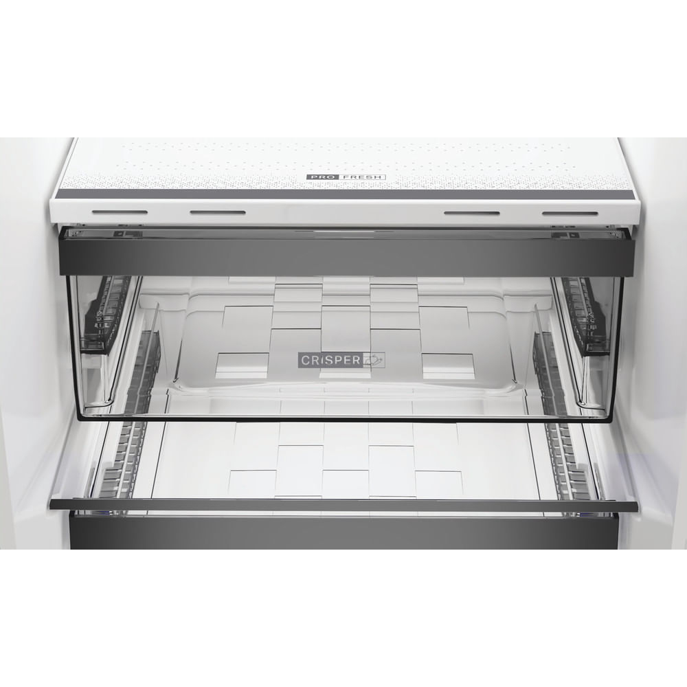 Un cassetto crisper vuoto per frigorifero con etichette "CRISPER" e "PRO FRESH".