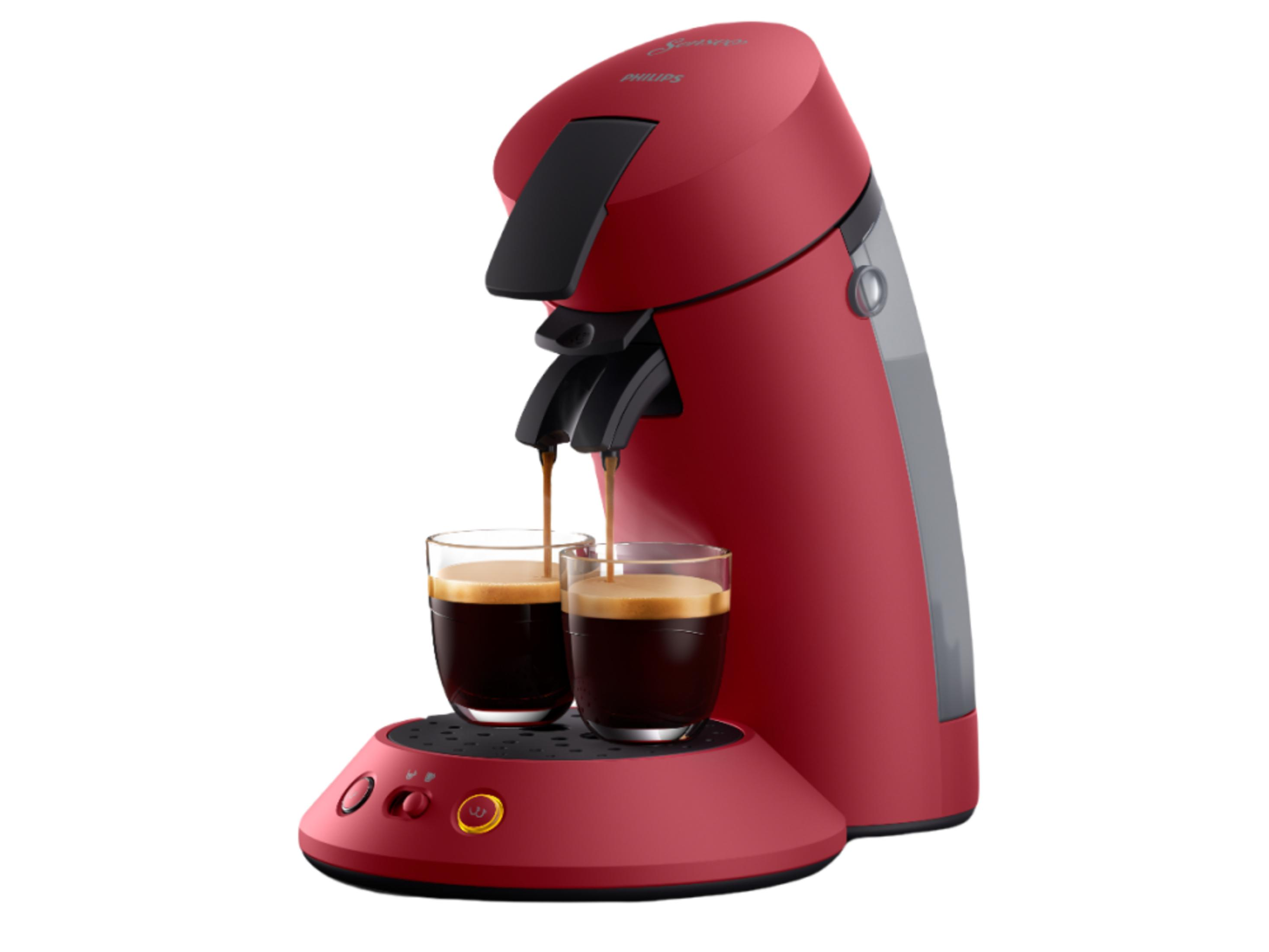 Eine rote Philips Kaffeemaschine brüht Kaffee in zwei Gläser.