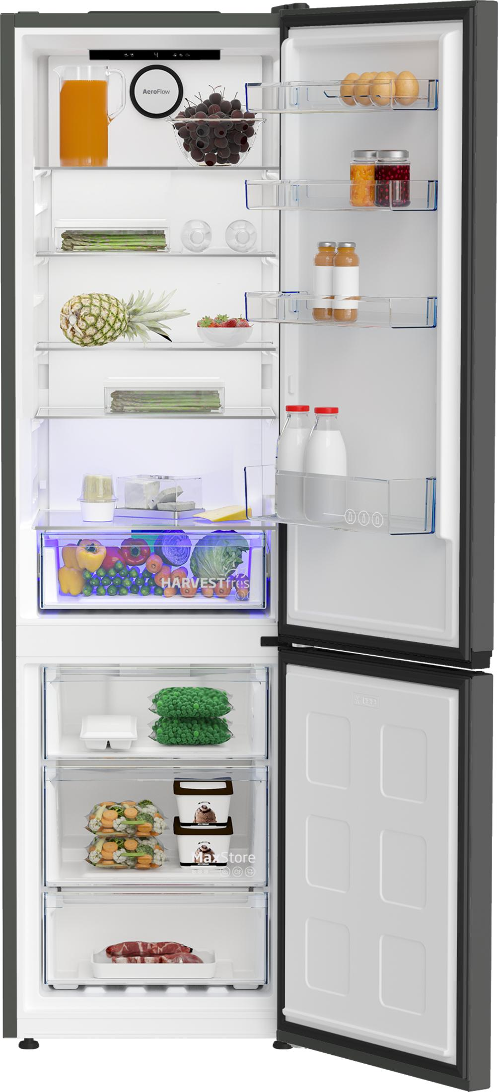 Refrigerador abierto lleno de comida: zumo, frutas, verduras, leche, huevos, carne.