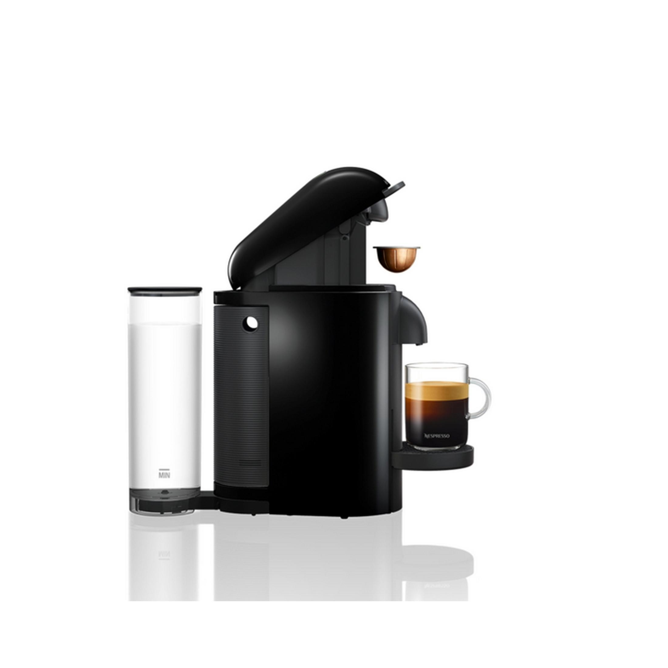 Cafetera negra con depósito de agua y una taza de espresso.