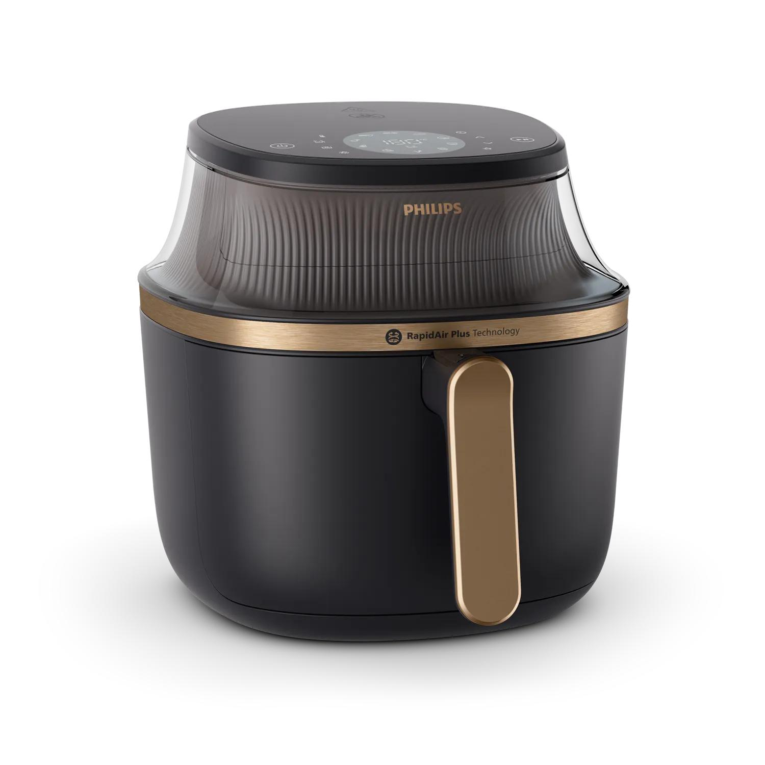 Zwarte Philips airfryer met gouden handvat en digitaal display.