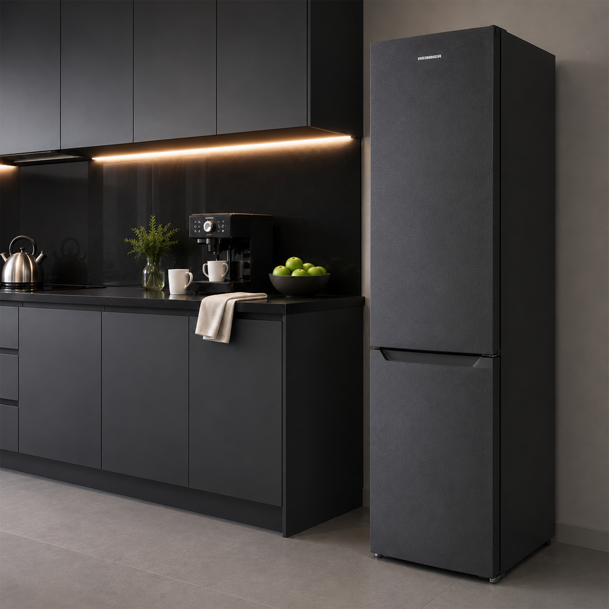Dark kitchen with a refrigerator, coffee machine, apples, and a kettle.