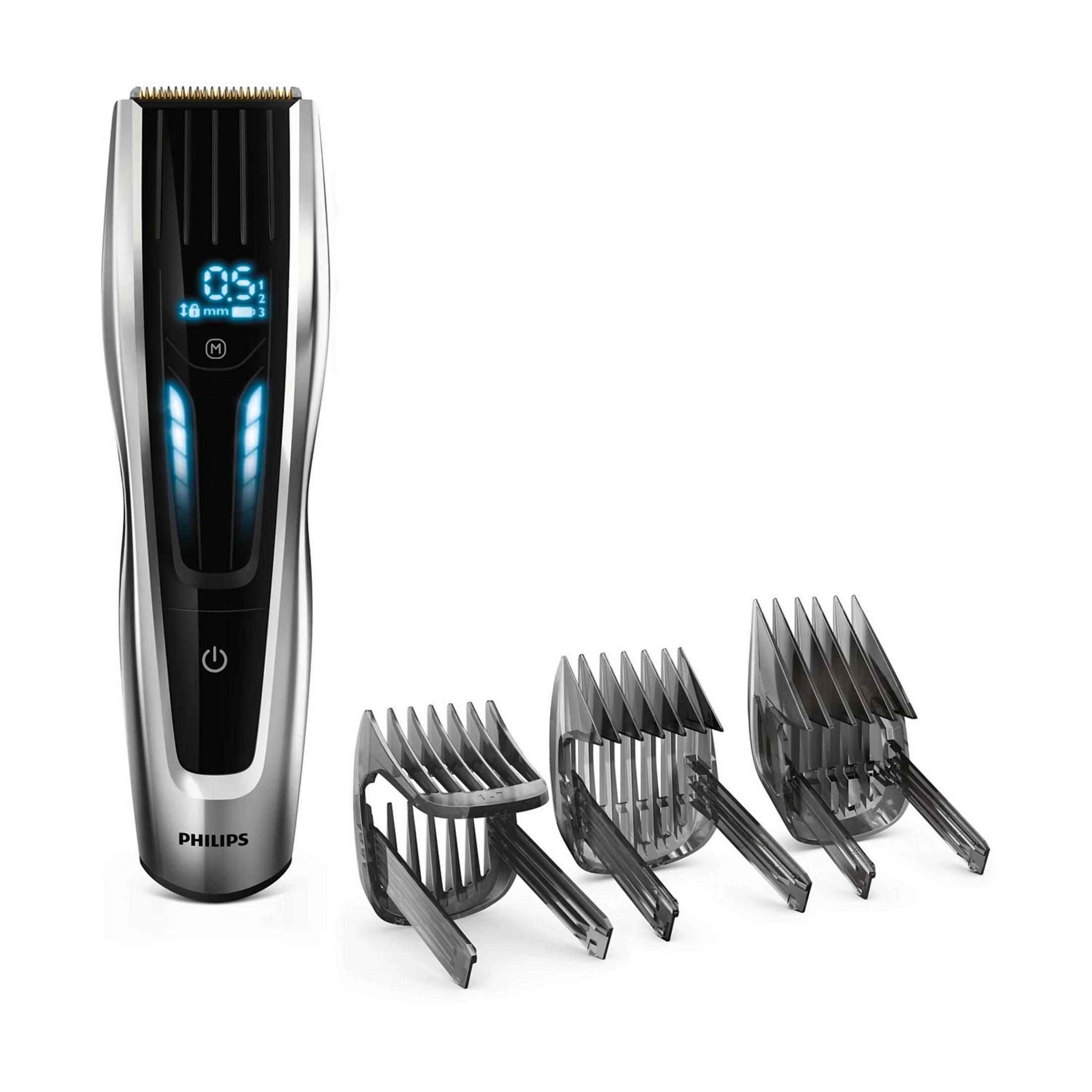 Ein Philips Haarschneider mit digitaler Längeneinstellung und drei Aufsätzen.