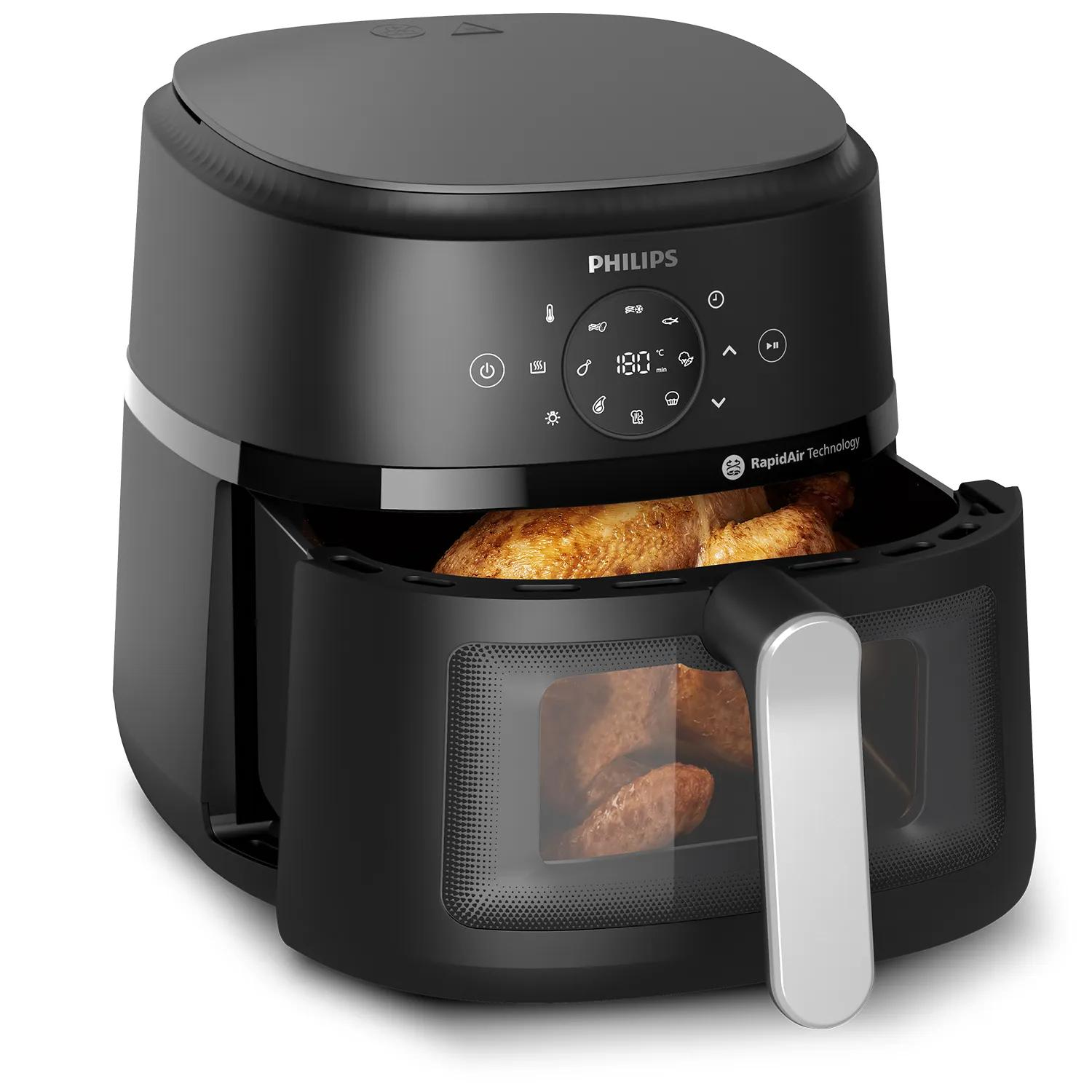 Friteuse à air Philips noire avec poulet rôti à l'intérieur et écran d'affichage numérique.