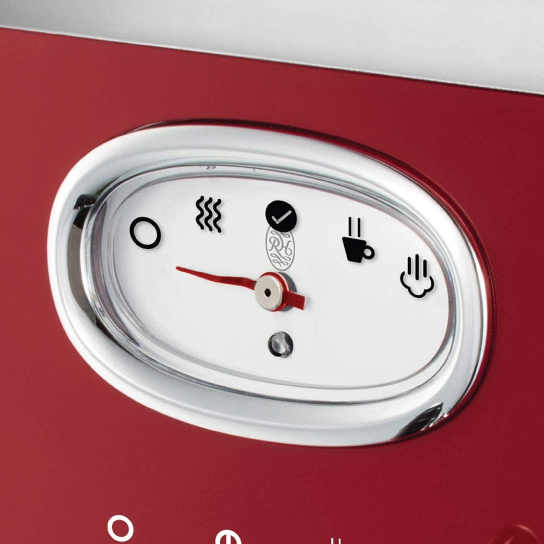 Ein rotes Gerät mit einem ovalen Messgerät mit Symbolen für Hitze, Kaffee und Dampf.