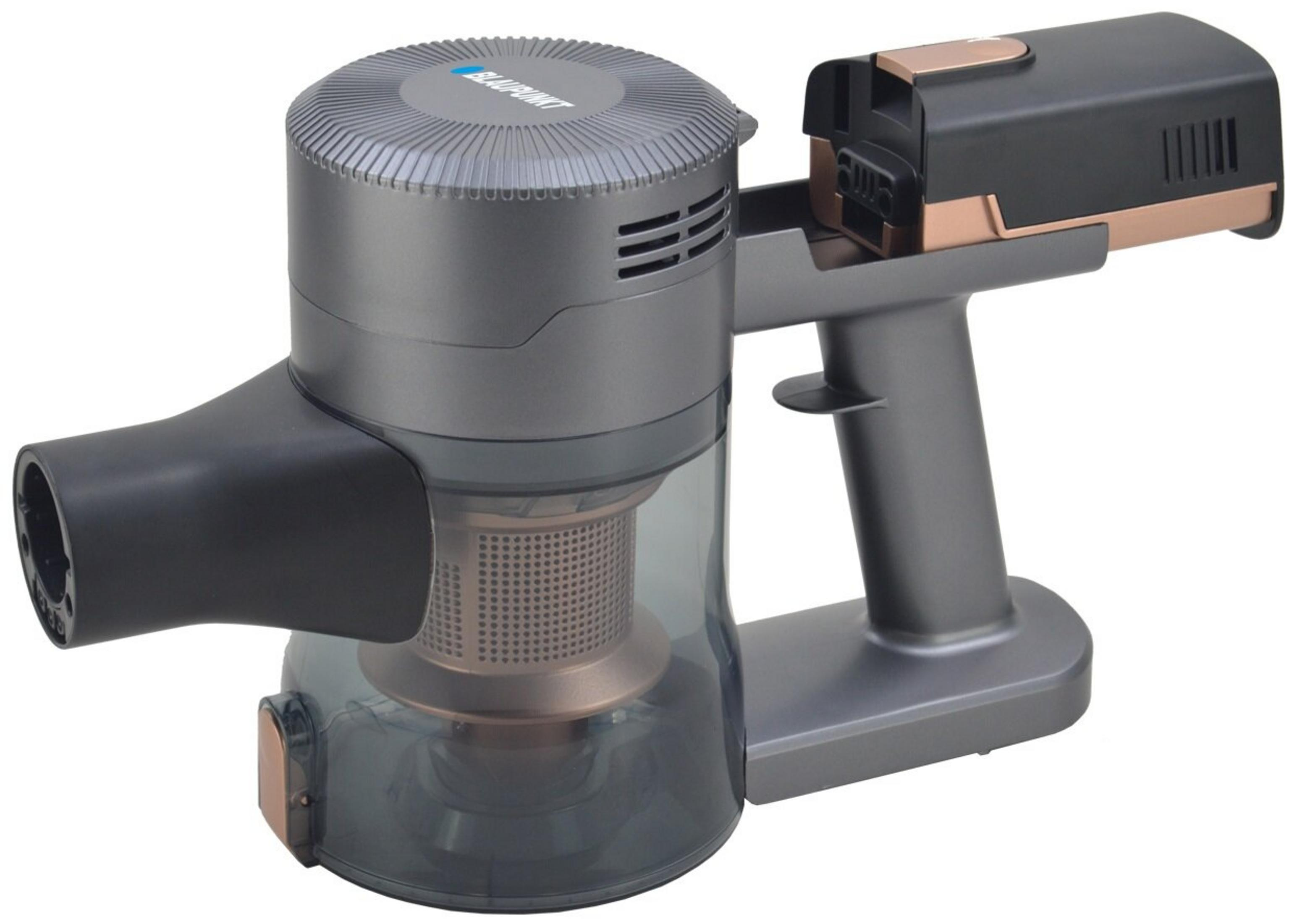 Aspirapolvere portatile grigio con contenitore polvere trasparente e accenti rame.