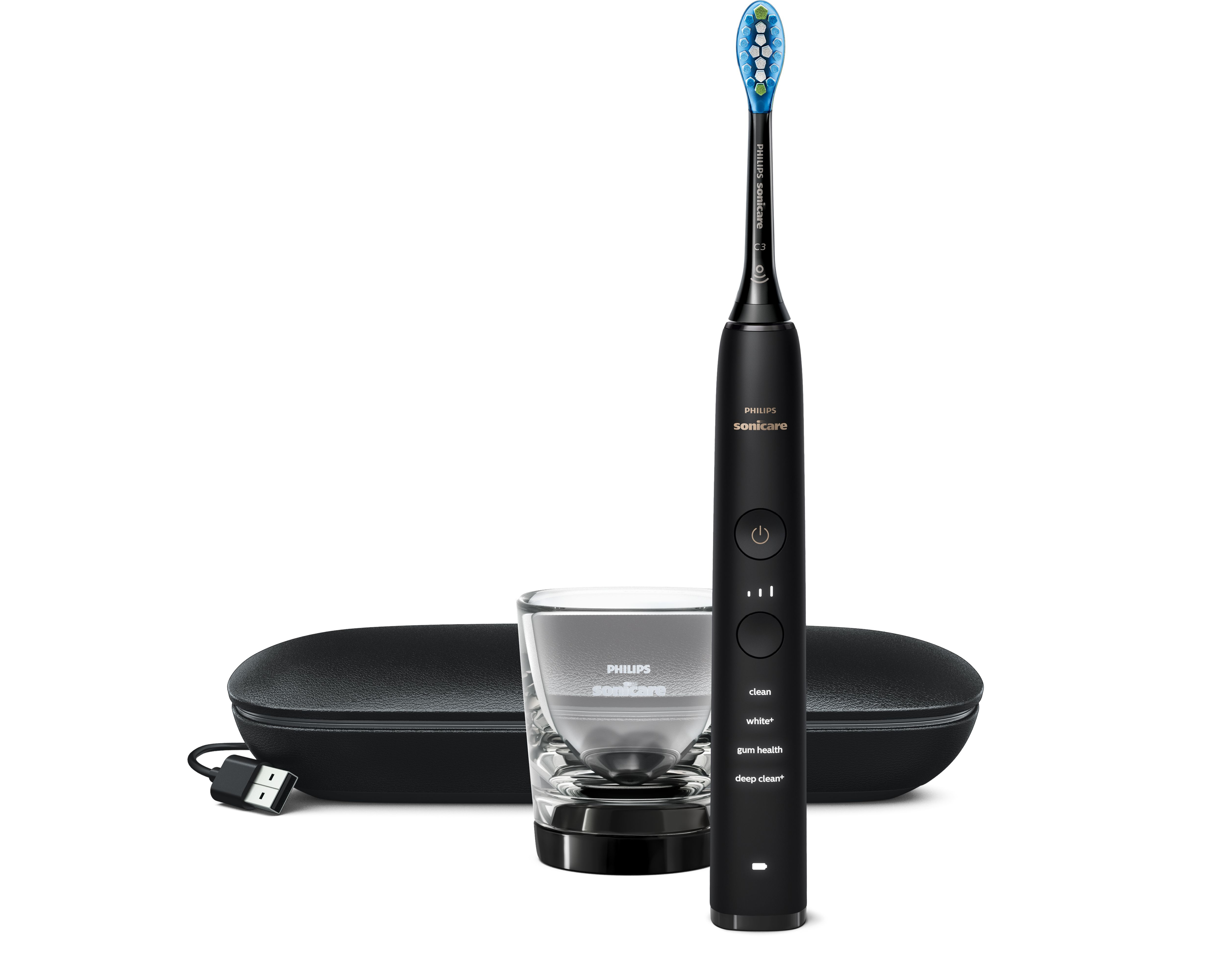 Cepillo de dientes sónico negro con vaso de carga, estuche y cable USB.