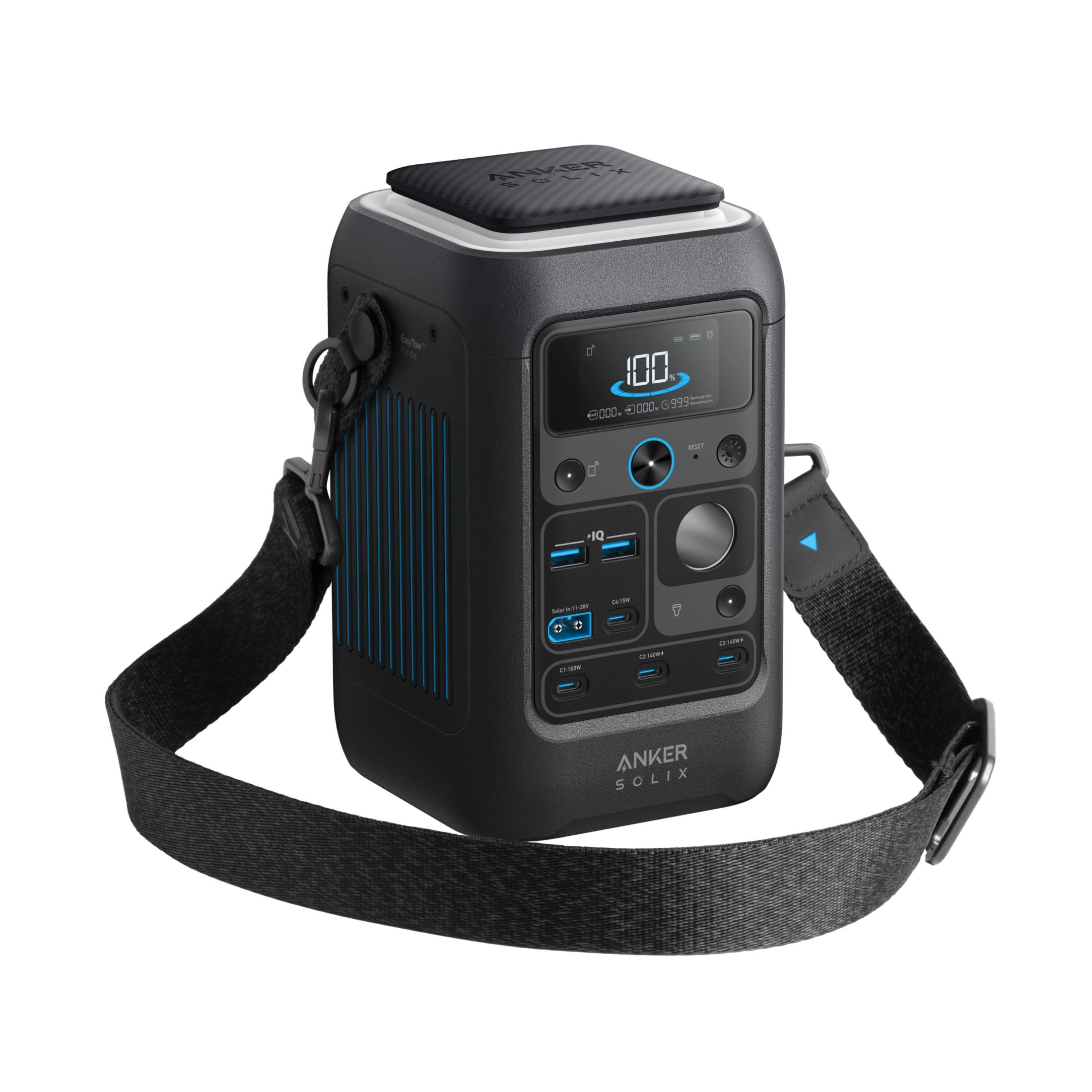 Tragbare Anker Solix Powerstation mit Digitalanzeige, USB-Anschlüssen und schwarzem Tragegurt.