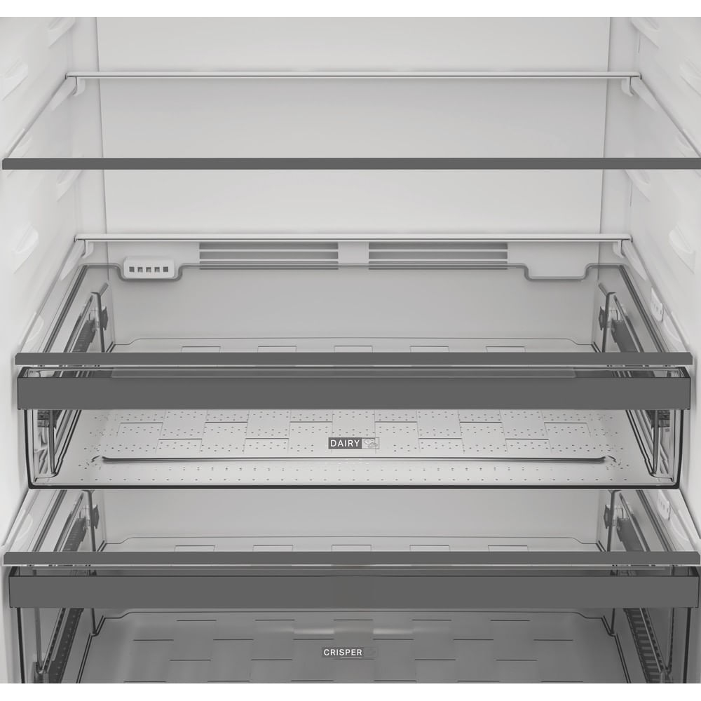 Interior view of an empty refrigerator with shelves, a dairy drawer, and a crisper drawer.