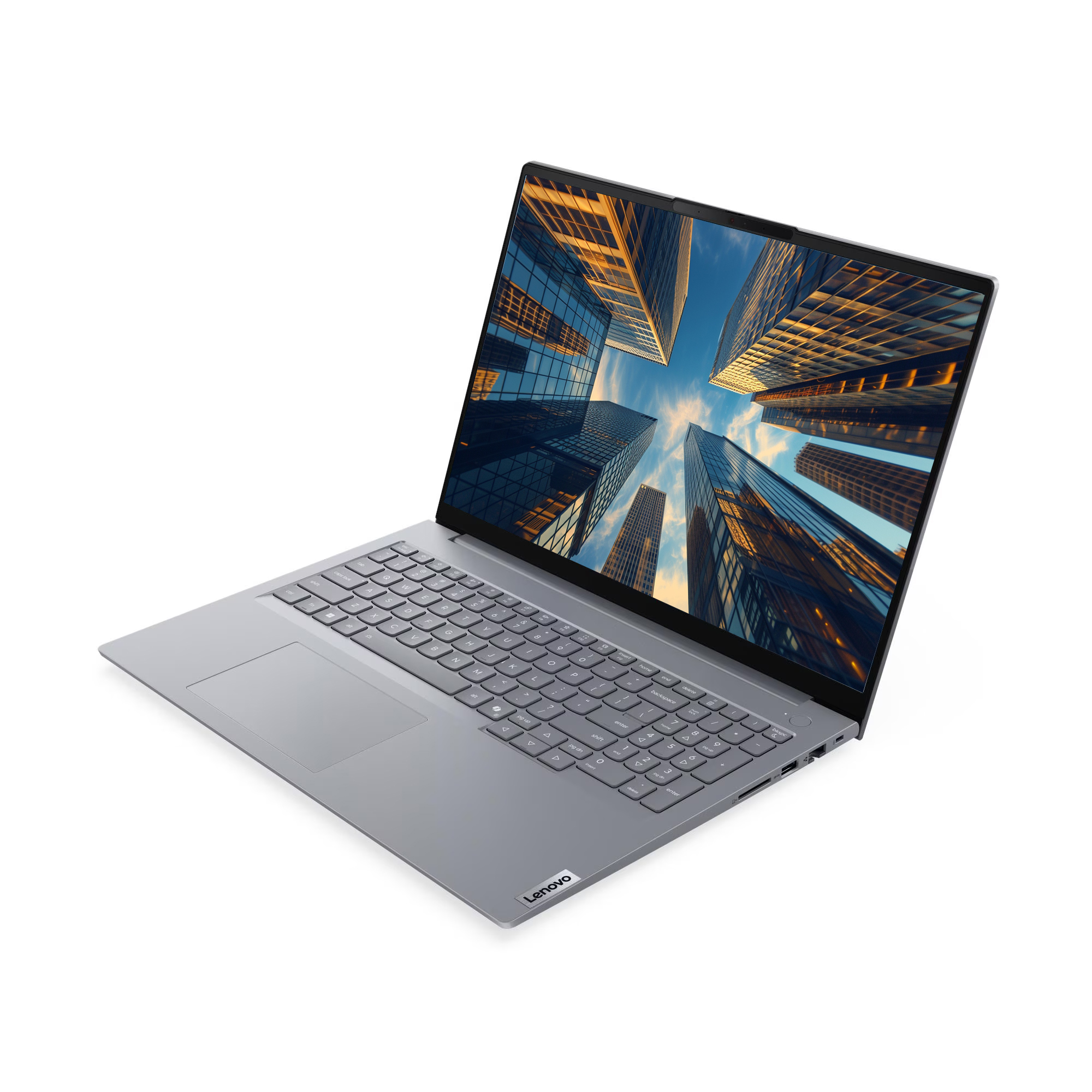 Ekranında gökdelenler gösteren gümüş rengi Lenovo dizüstü bilgisayar.