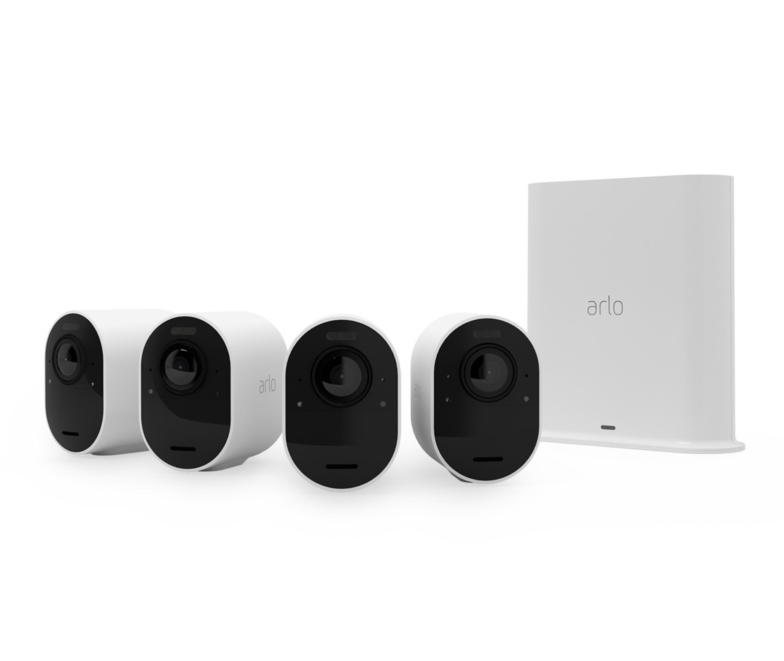 Vier weiße Arlo-Kameras und eine Basisstation auf weißem Hintergrund.
