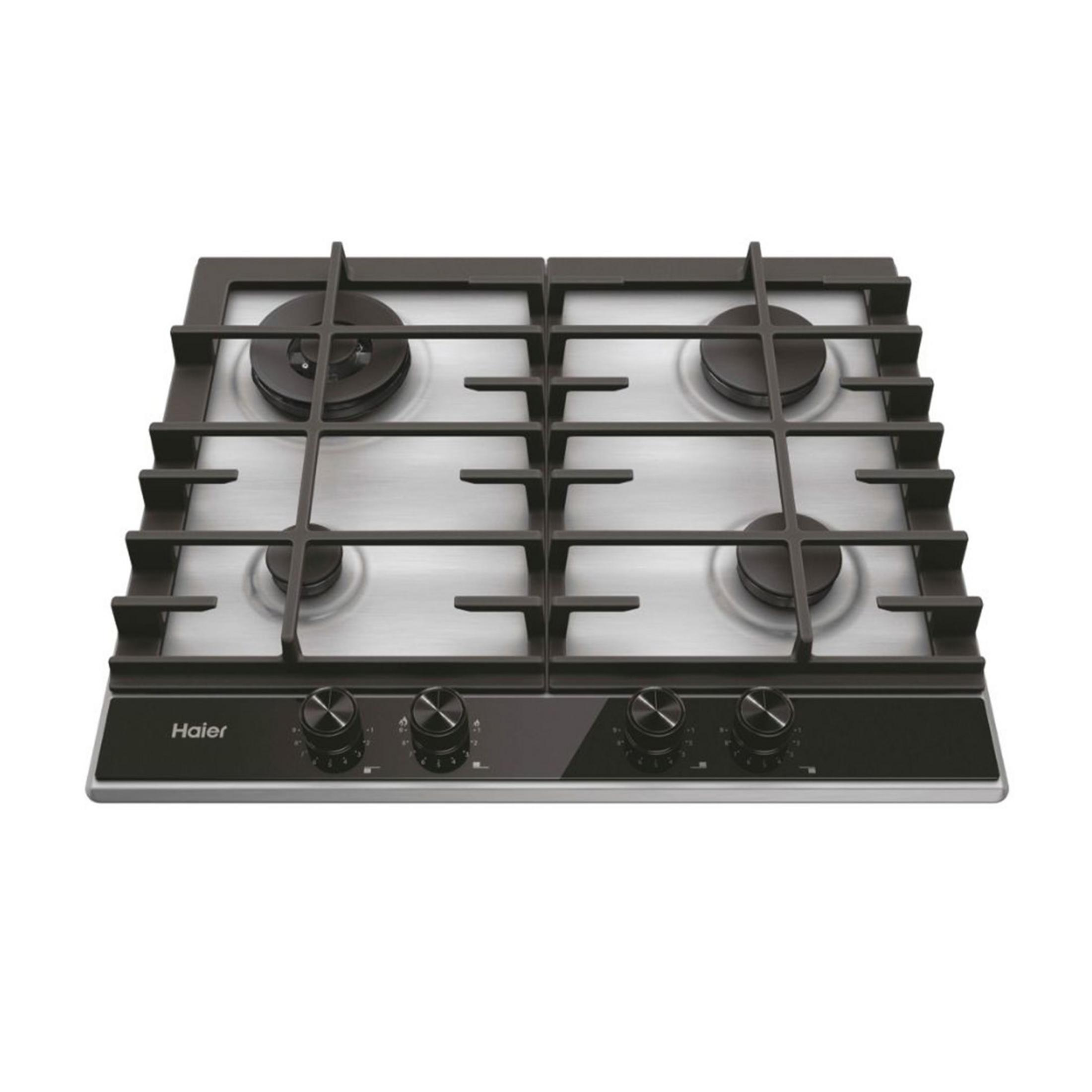 Una cocina de gas Haier con cuatro quemadores y mandos giratorios negros sobre superficie brillante.
