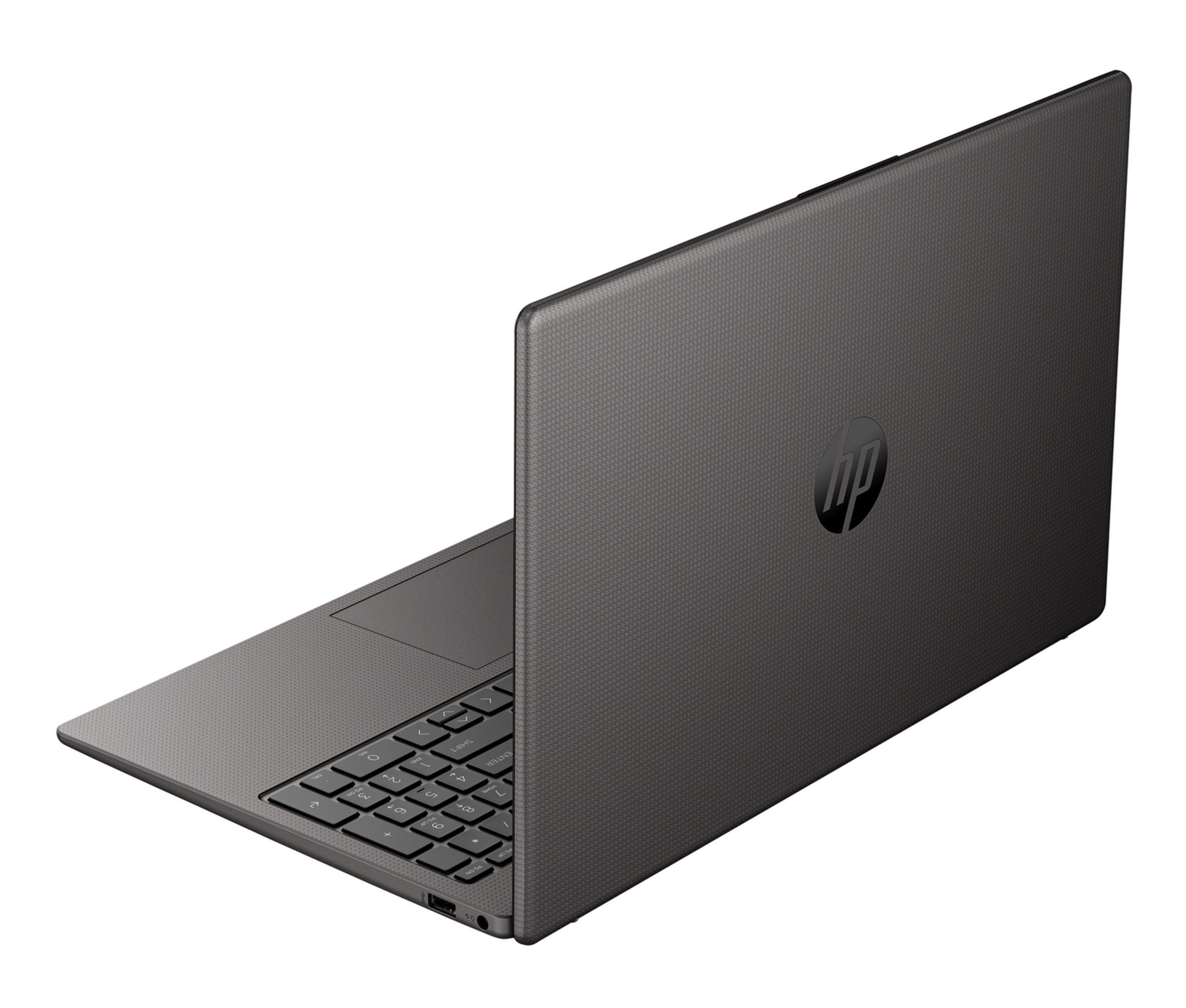 Un portátil HP cerrado y oscuro con teclado y panel táctil sobre fondo blanco.