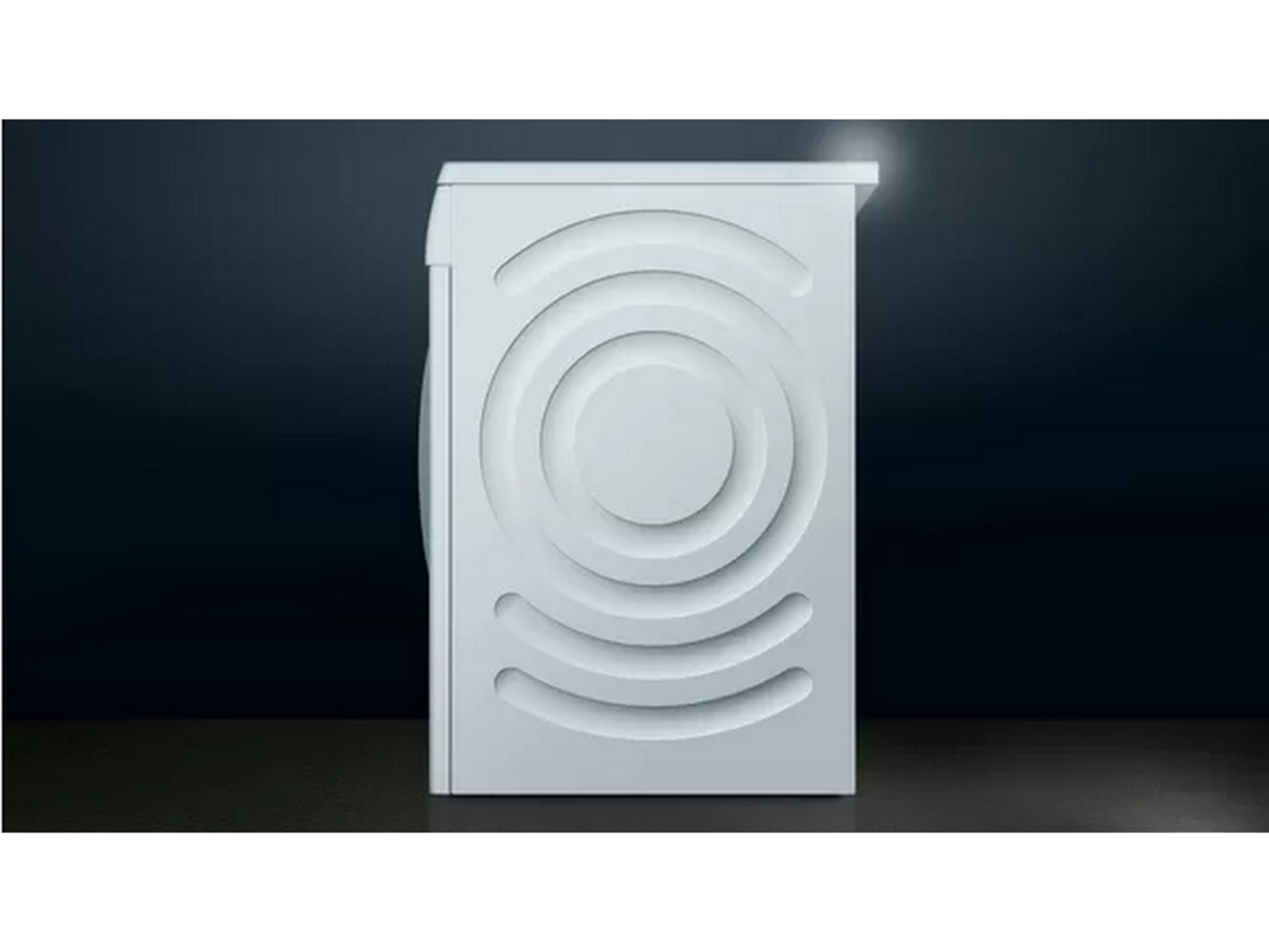 Weiße Waschmaschine mit konzentrischen Kreisen auf der Seite, dunkler Hintergrund.