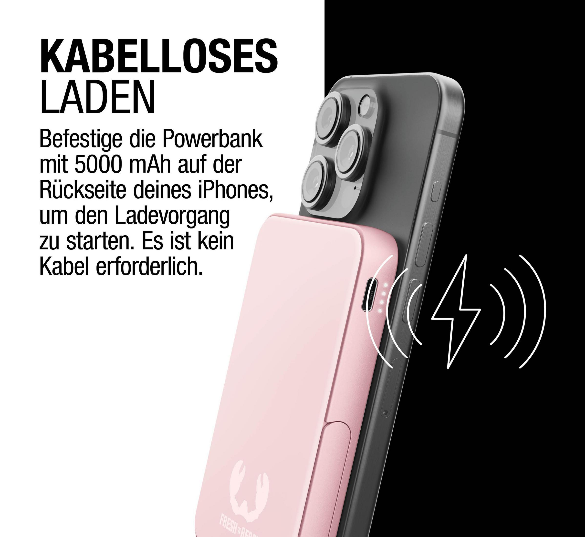 Ein rosafarbener Akku ist an der Rückseite eines iPhones befestigt.