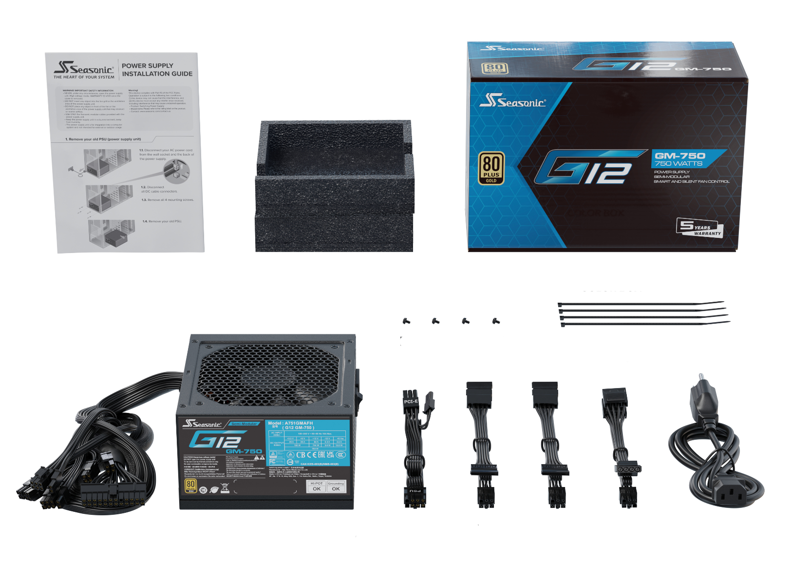 Alimentatore PC, cavi, manuale e scatola su sfondo bianco.