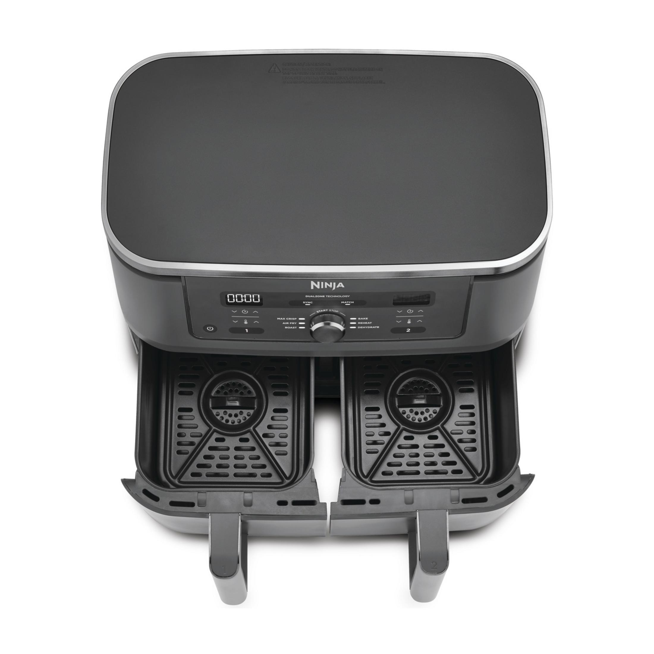 Una friggitrice ad aria Ninja DualZone nera con due cassetti aperti, vista dall'alto.
