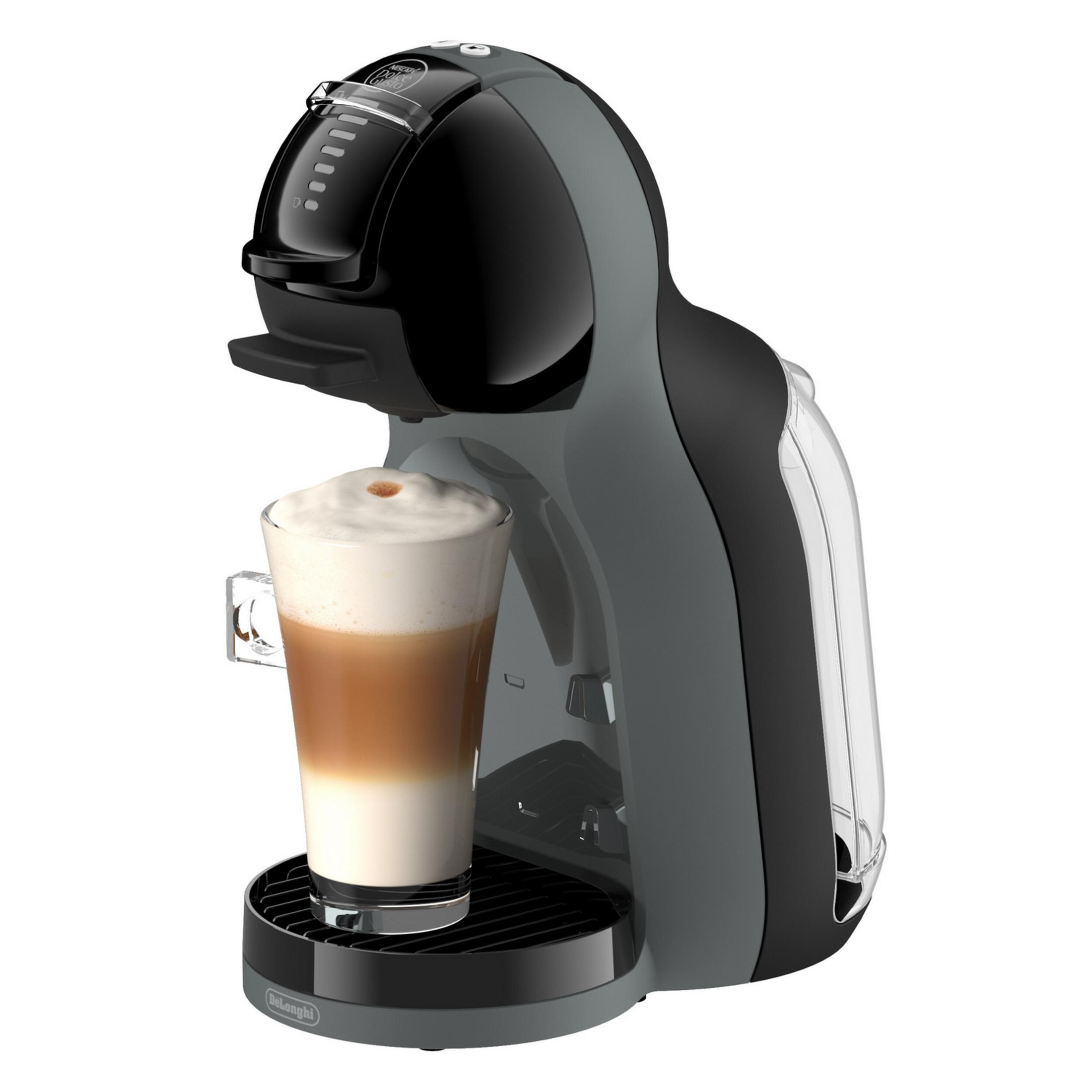 Una macchina da caffè grigia e nera con un bicchiere di caffè stratificato e schiuma.
