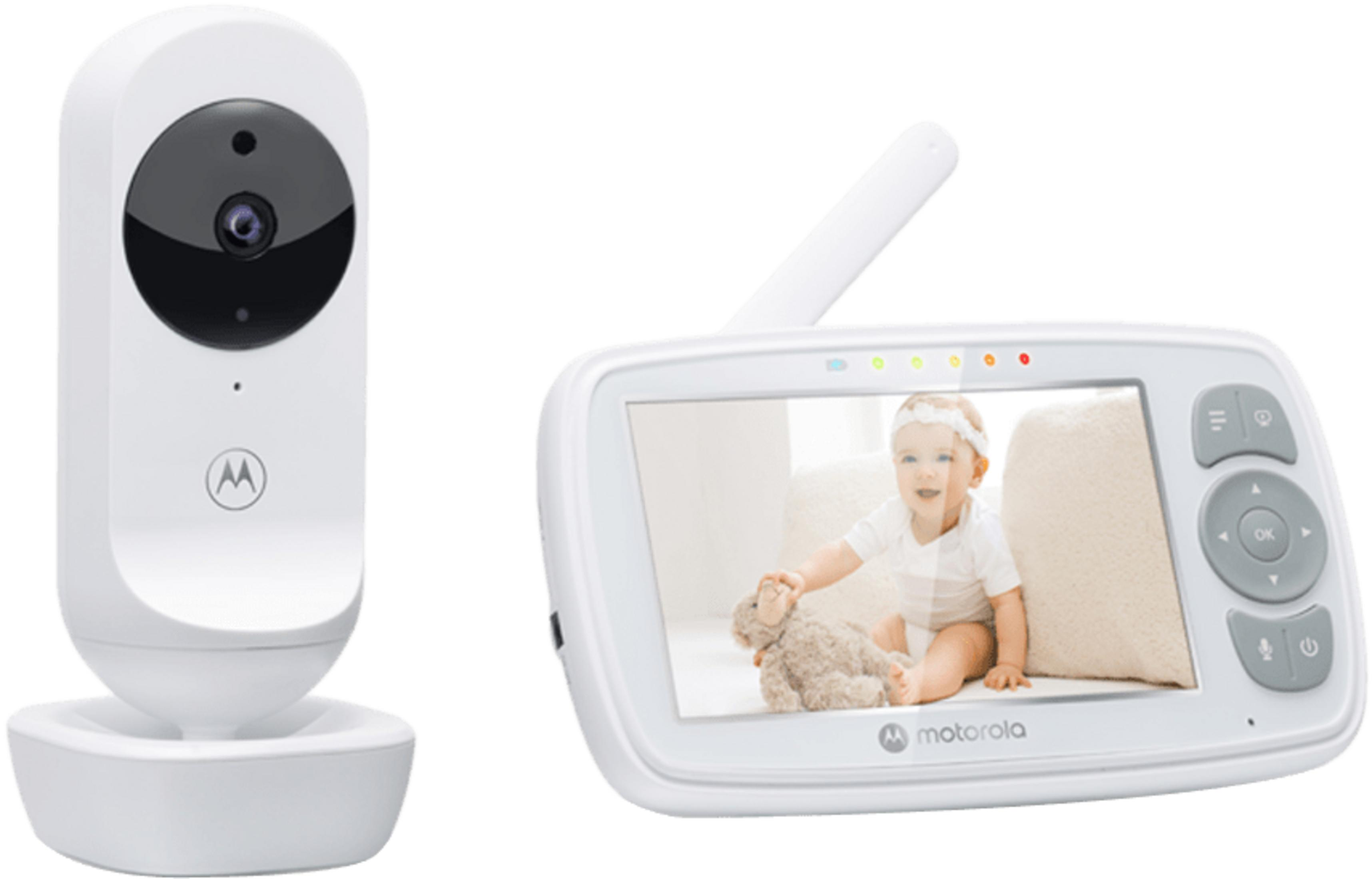 Ein weißer Baby Monitor mit Kamera und Bildschirm, auf dem ein Baby spielt.