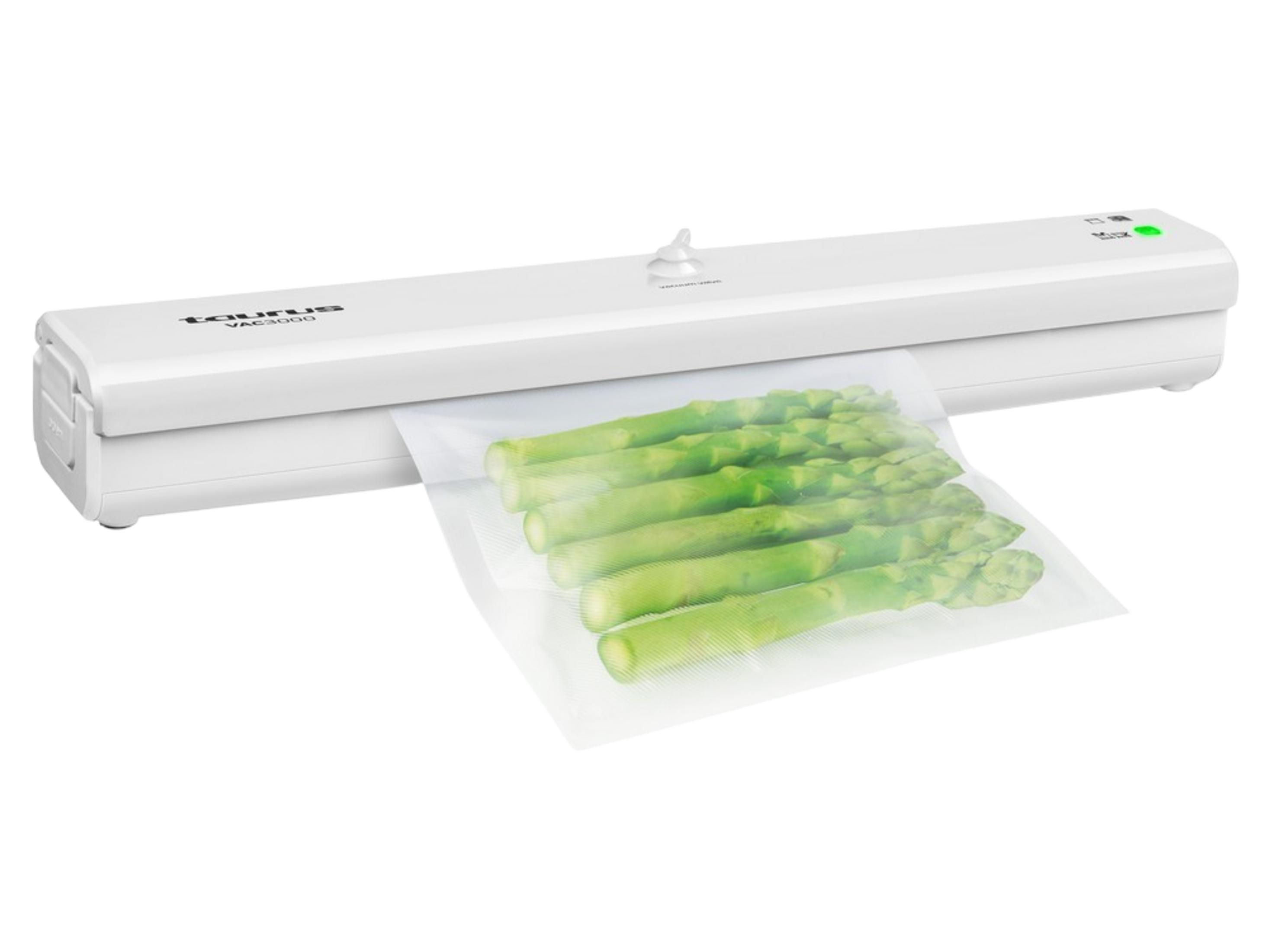 Una envasadora al vacío blanca con logo 'Taurus VAC3000' y luz verde.