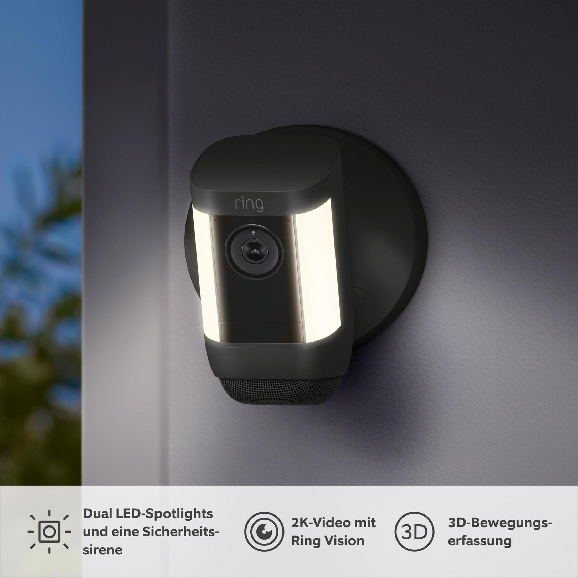 Eine Ring Überwachungskamera mit Scheinwerfern und Lautsprecher an einer Wand.