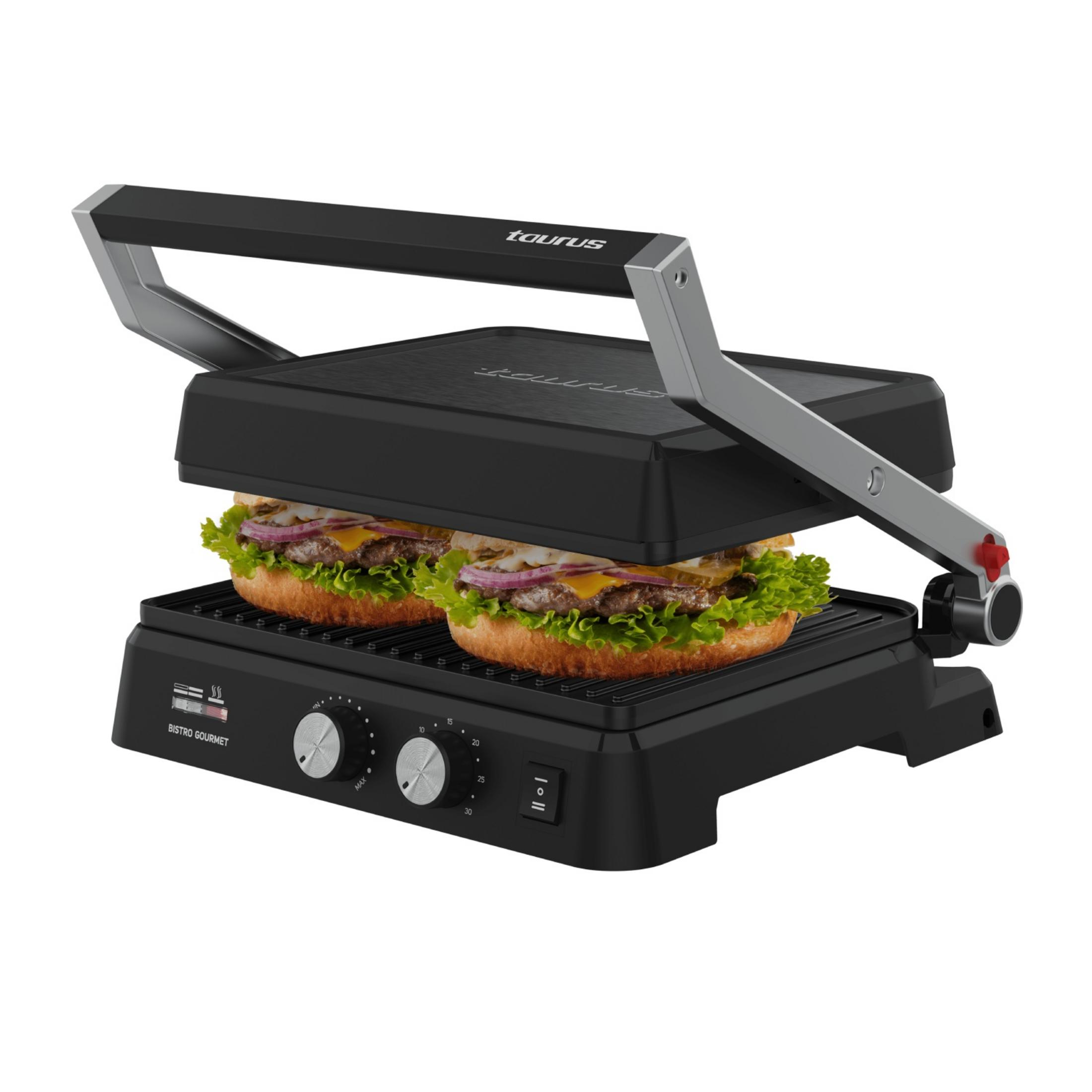 Una bistecchiera elettrica nera con due hamburger in cottura.