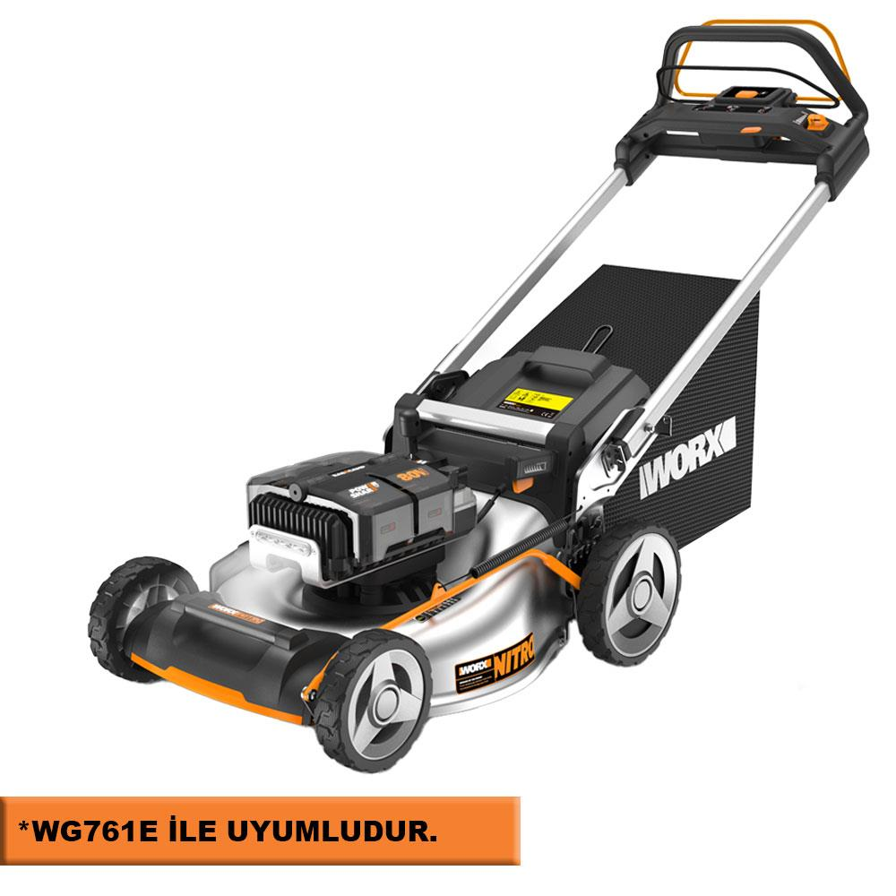 Turuncu detaylı, gümüş ve siyah çim biçme makinesi, çim torbalı.