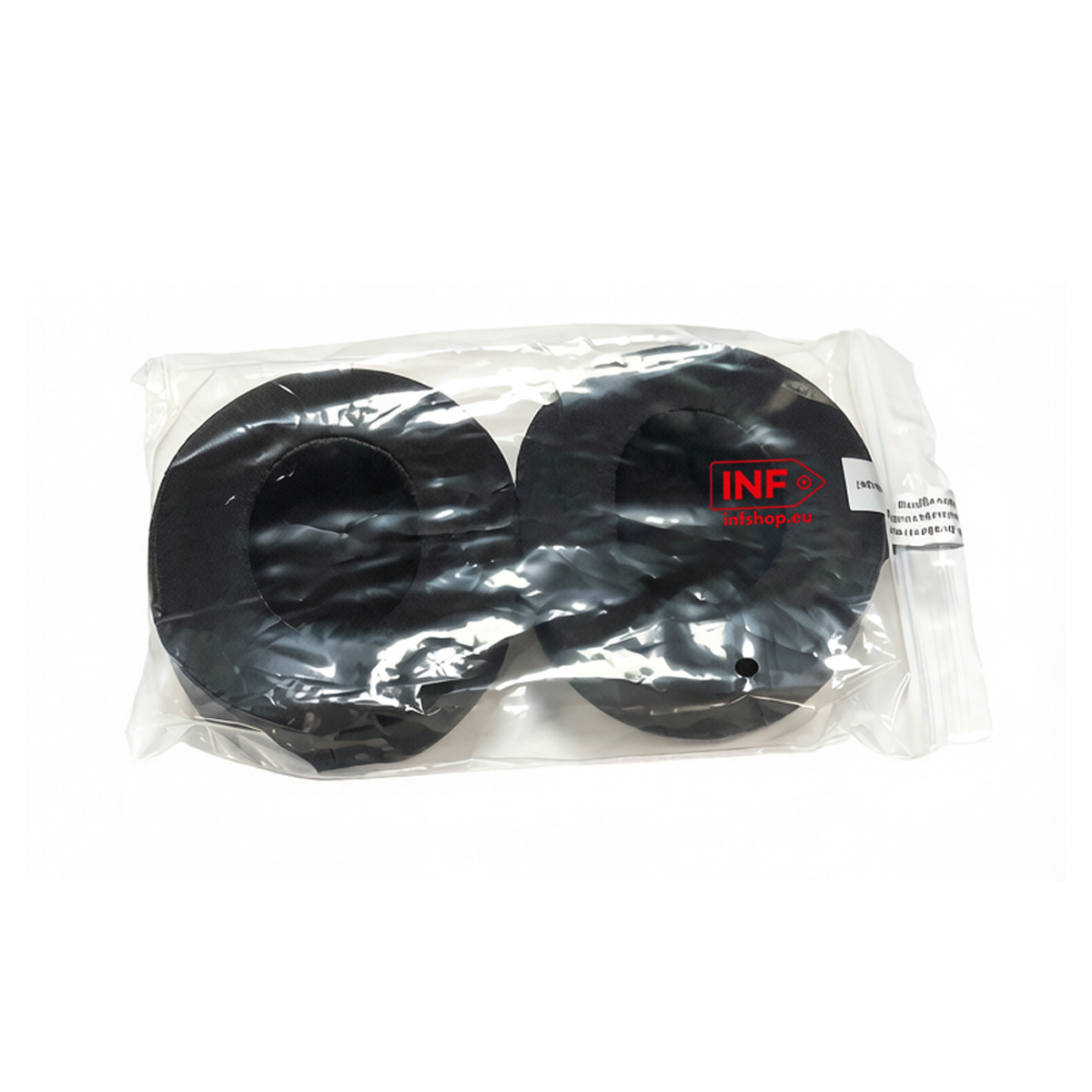 Zwei schwarze runde Kopfhörer-Ohrpolster in Plastikverpackung mit Logo.