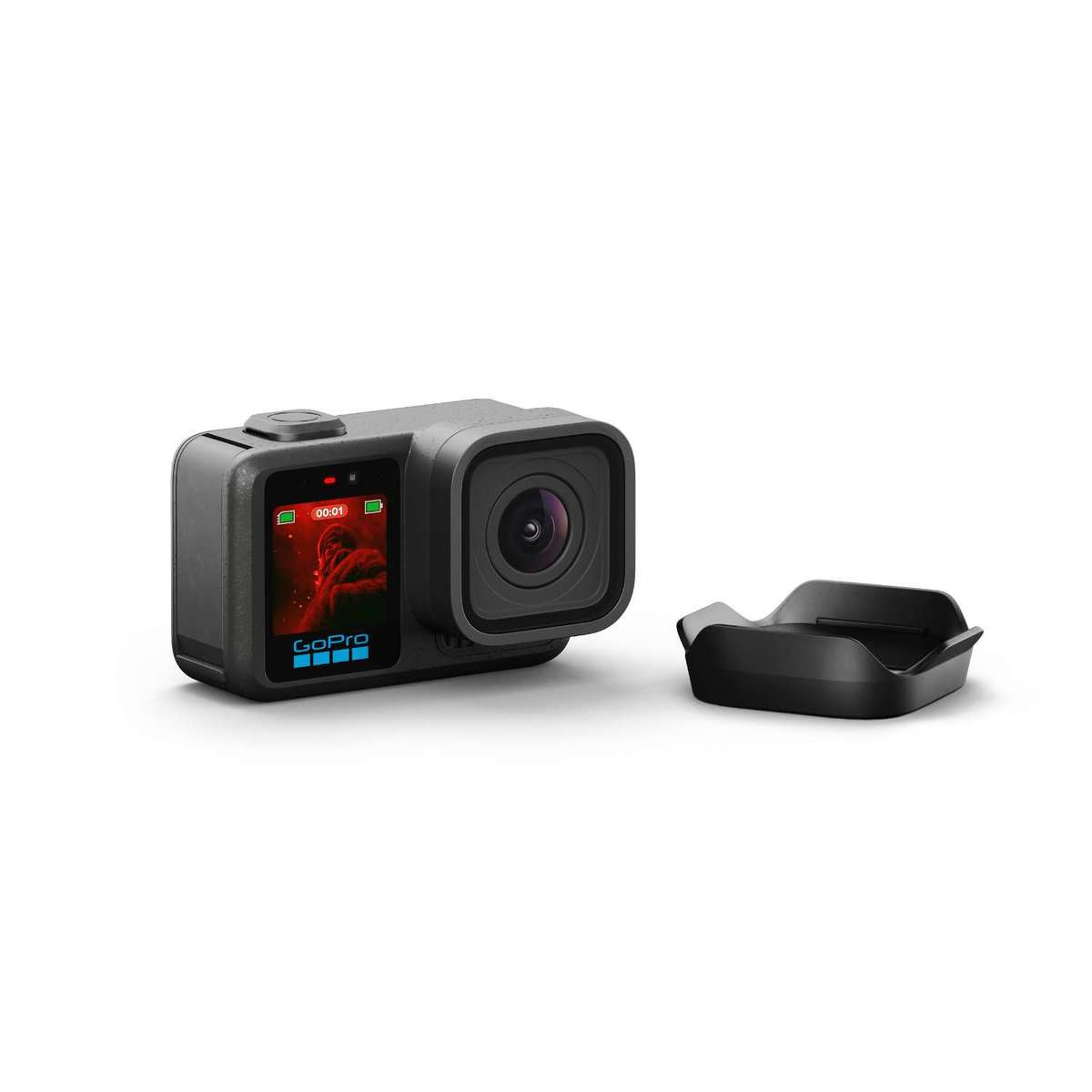 Lensli siyah GoPro kamera ve yanında küçük siyah bir aksesuar.