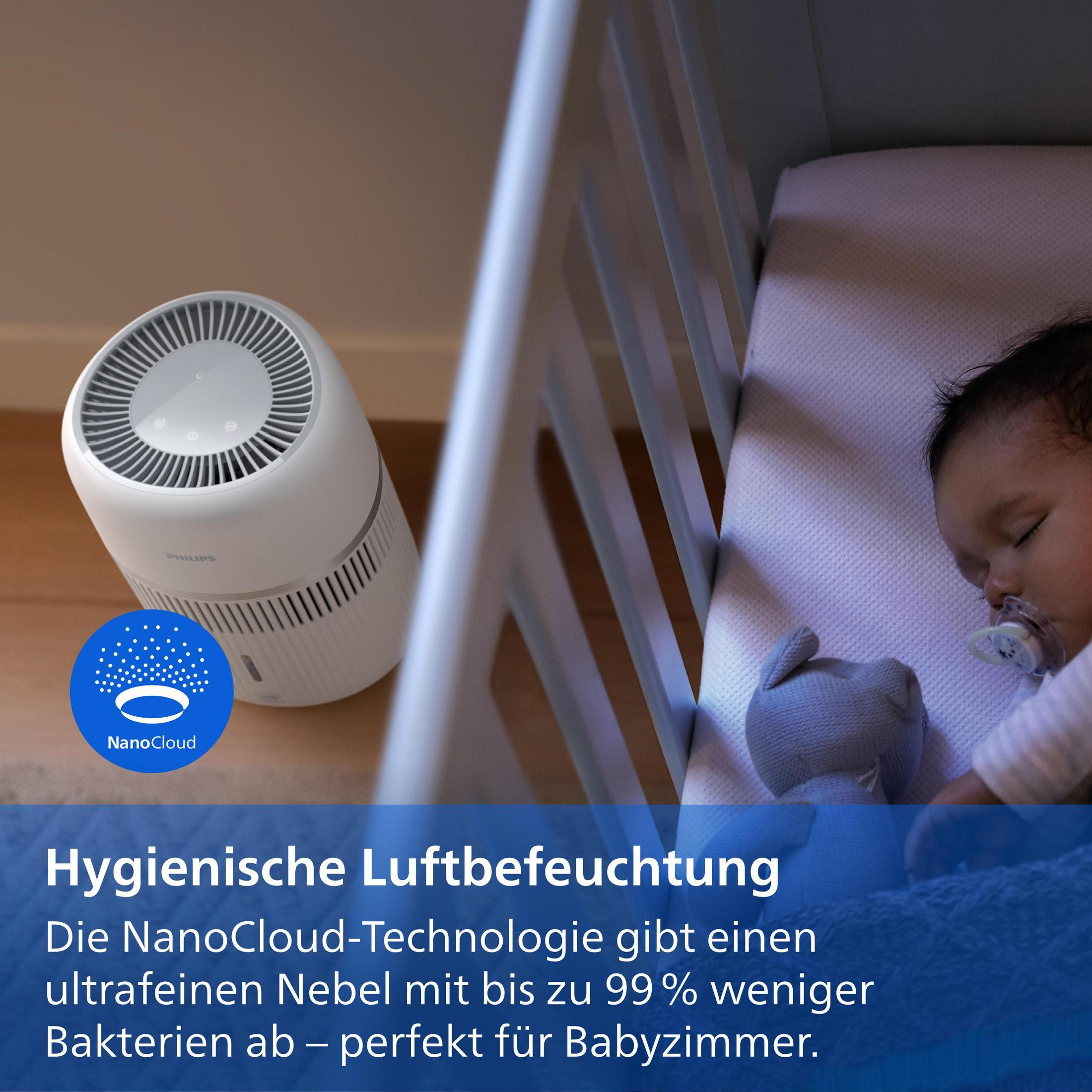 Ein Philips Luftbefeuchter steht neben einem Babybett, in dem ein Baby schläft.