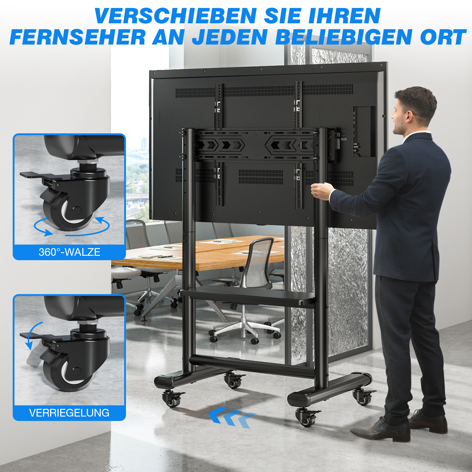 Mann in dunklem Anzug stellt einen großen Fernseher auf einem Rollständer in einem Büro auf.