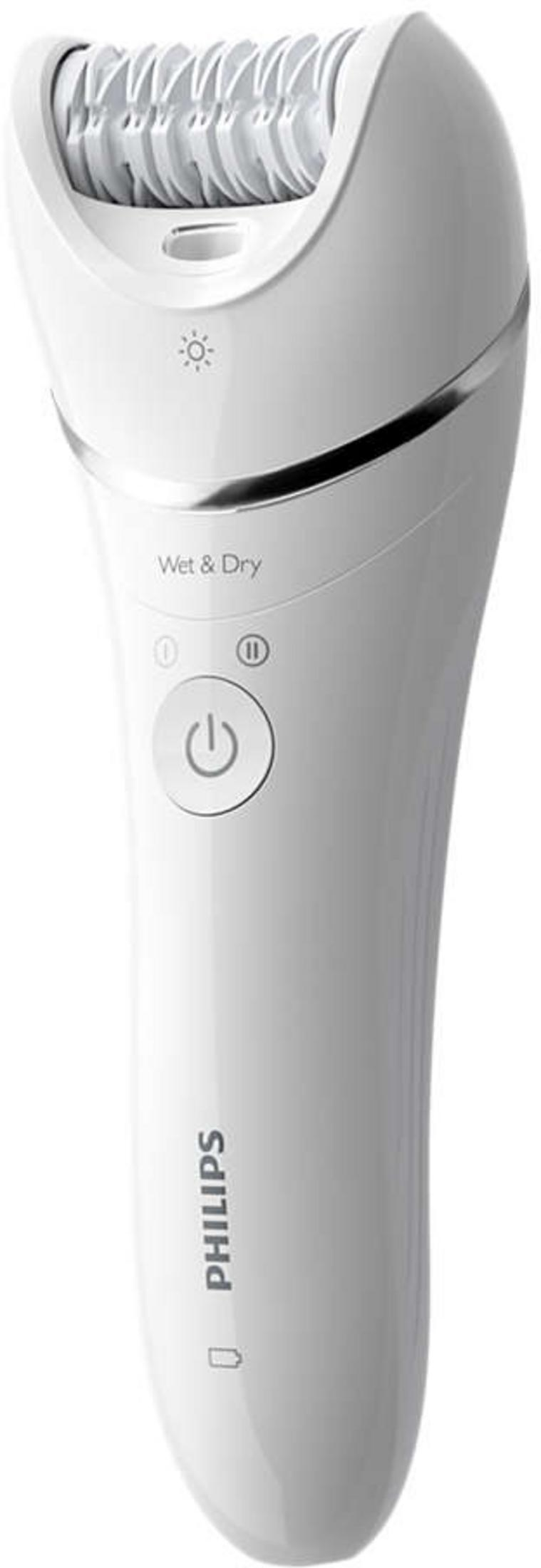 Ein weißer Philips Epilierer mit einem Griff und einem Aufsatz.