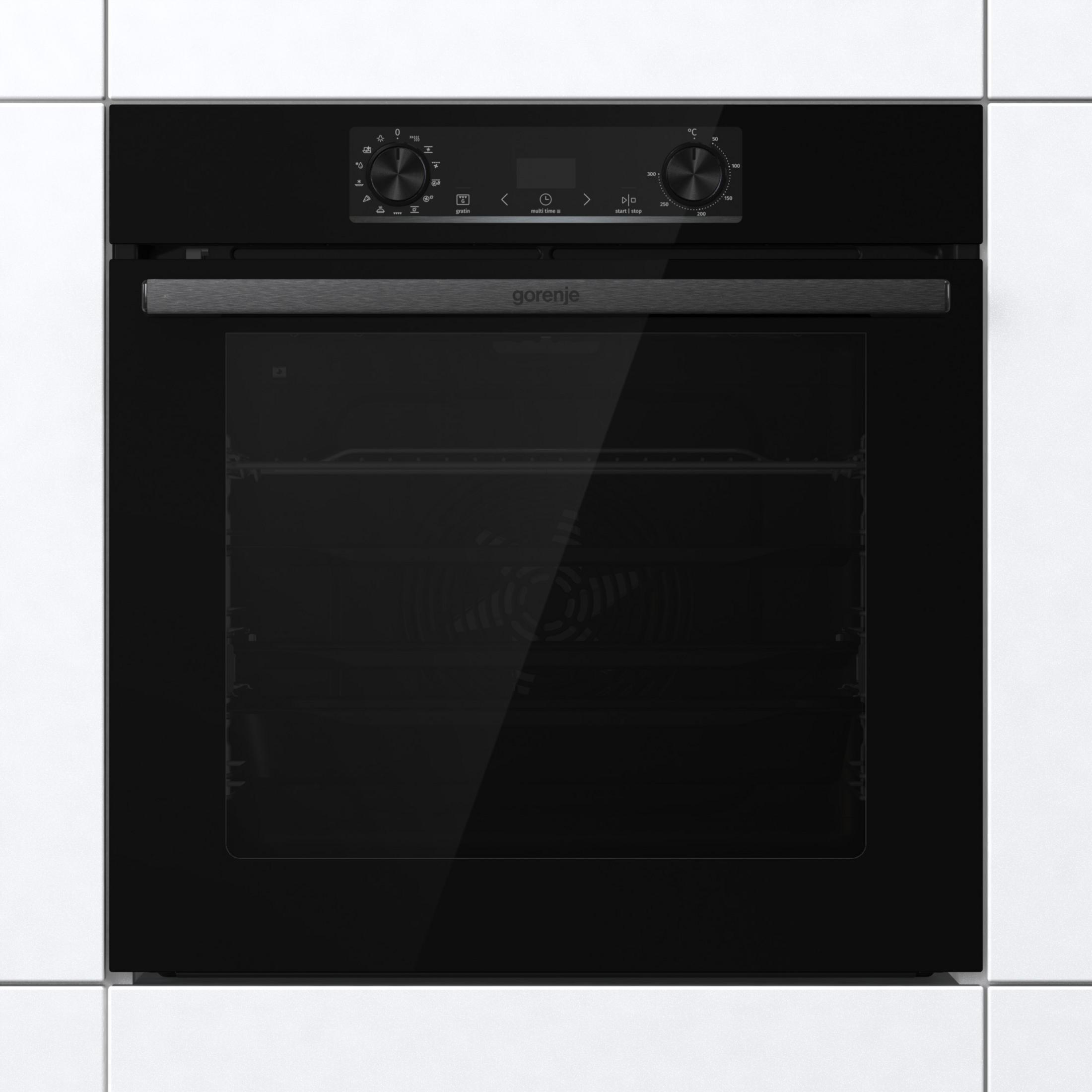 Un moderno forno nero con display digitale e manopole di controllo.