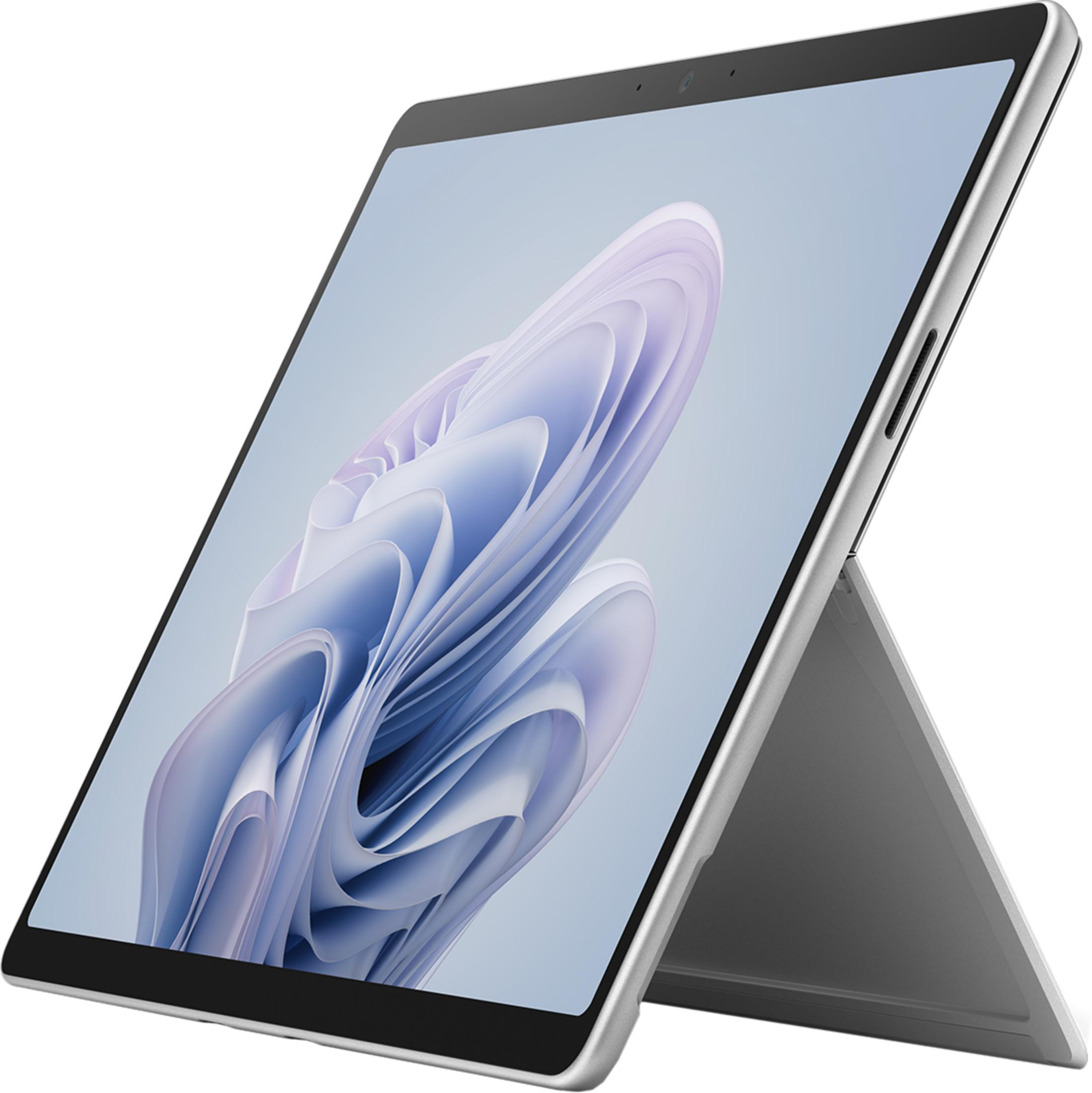 Ein silbernes Tablet mit einem abstrakten lila Muster auf dem Bildschirm.
