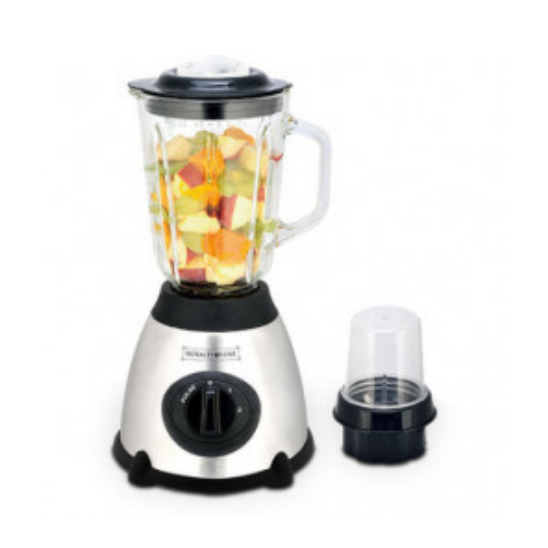 Ein silberner Standmixer mit Glasbehälter voller geschnittener Früchte neben einem Aufsatz.