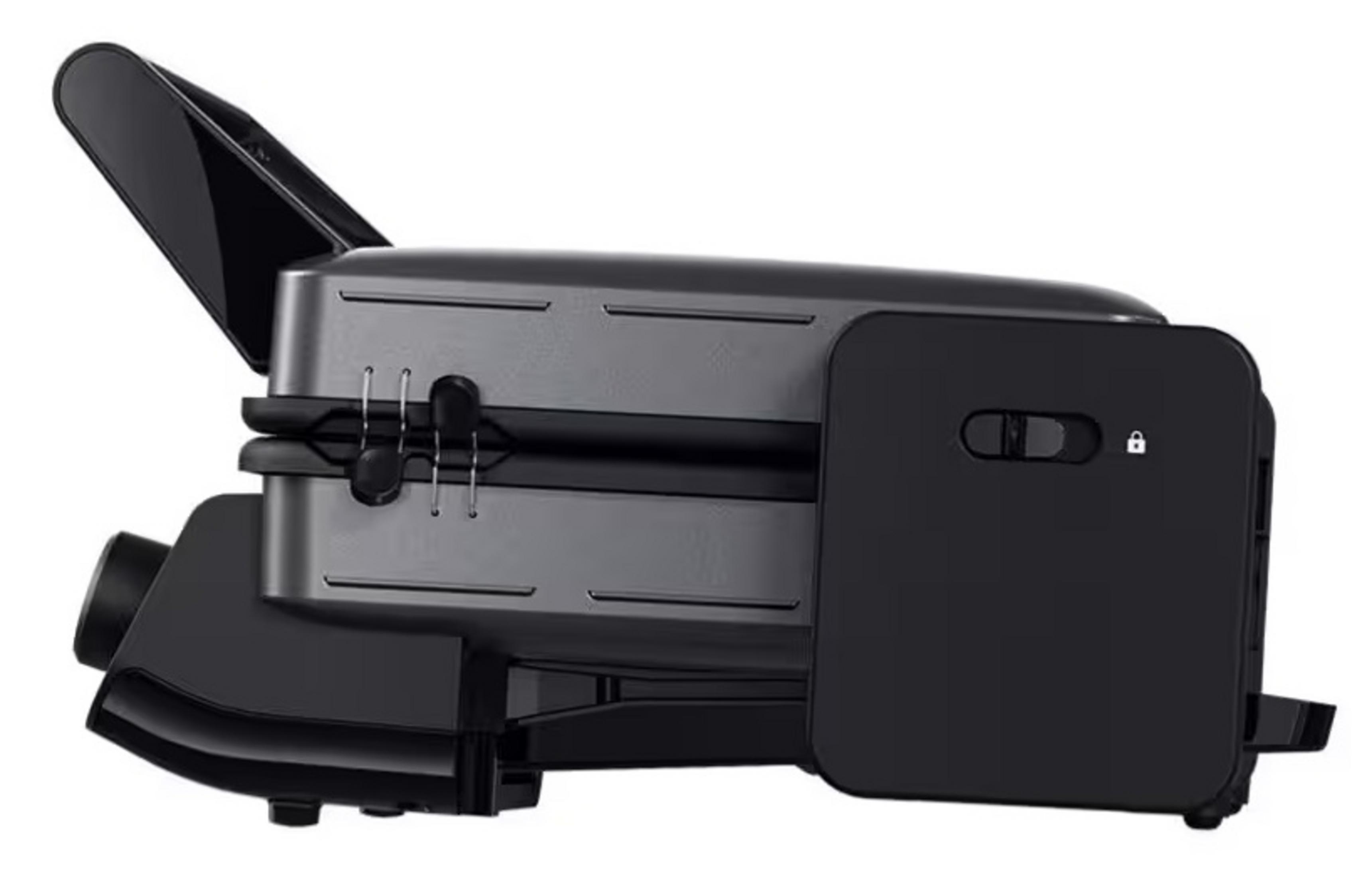 Ein schwarzer Toaster mit silbernen Akzenten und einem ausklappbaren Griff.