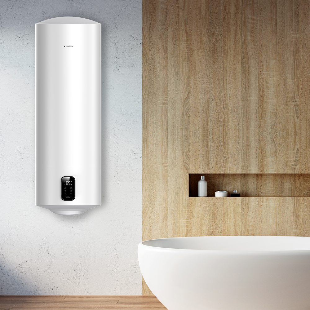 Un calentador de agua cilíndrico blanco con pantalla digital cuelga de una pared blanca junto a un acento de madera.