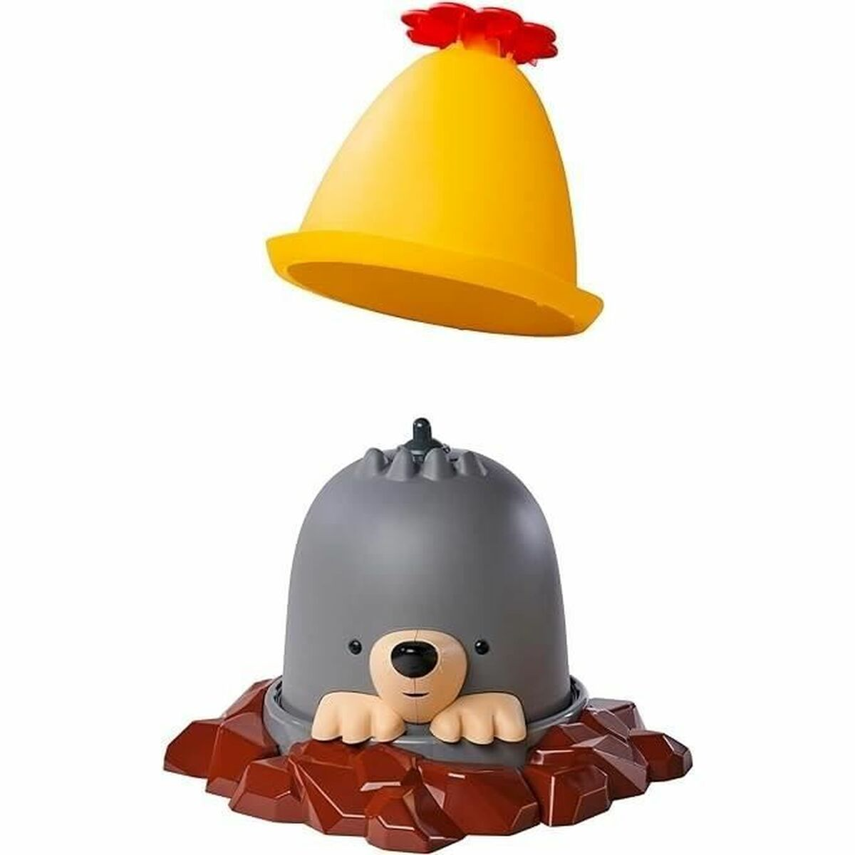 Ein gelber Hut mit roten Federn schwebt über einem Maulwurfspielzeug.