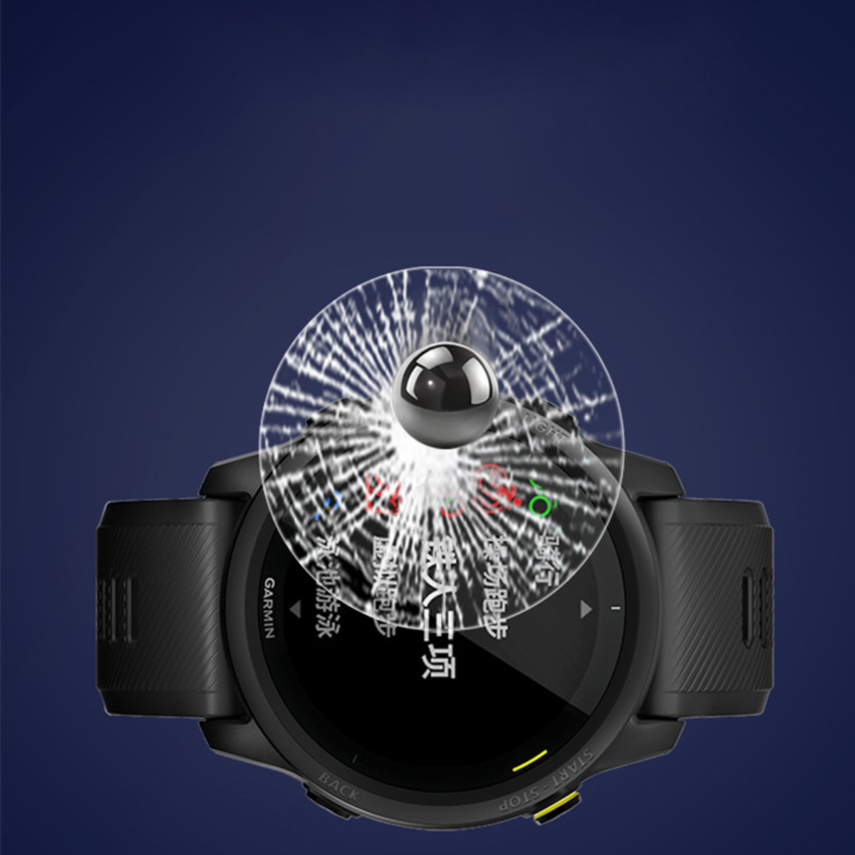 Smartwatch Garmin nera con schermo in vetro rotto e una palla che ci cade sopra.
