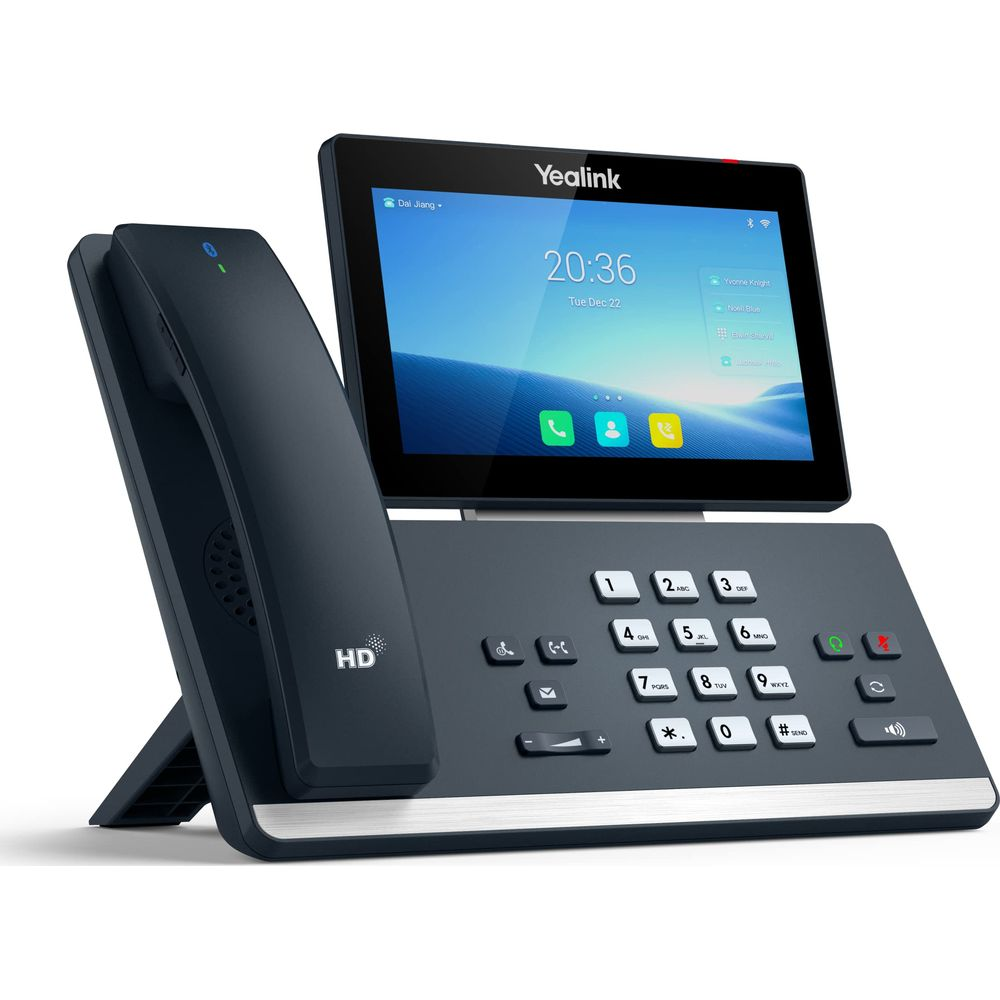 Ein dunkles Yealink Tischtelefon mit einem Touchscreen, das die Uhrzeit und das Datum anzeigt.