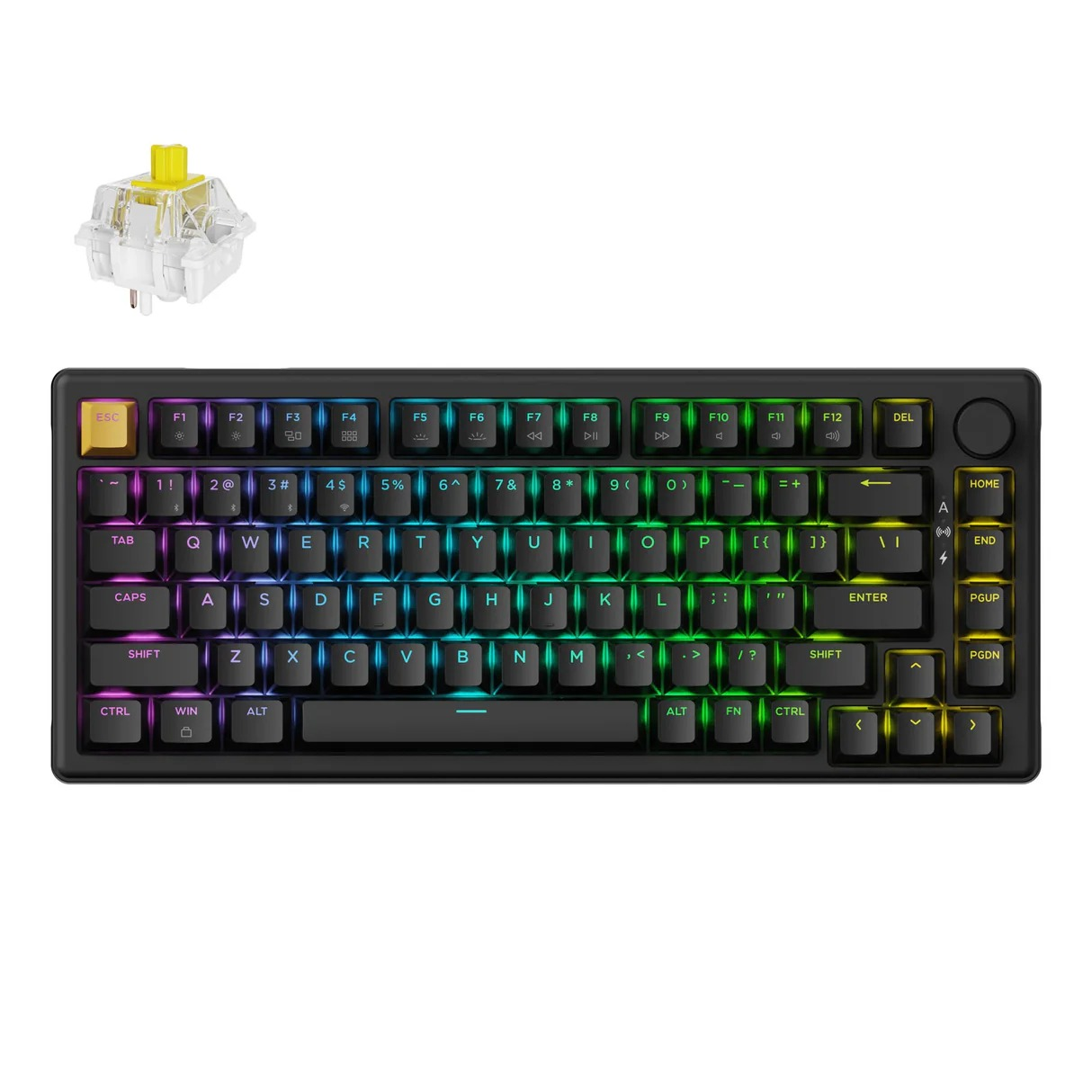 Czarna klawiatura mechaniczna z podświetleniem RGB i żółtym przełącznikiem. Białe tło.