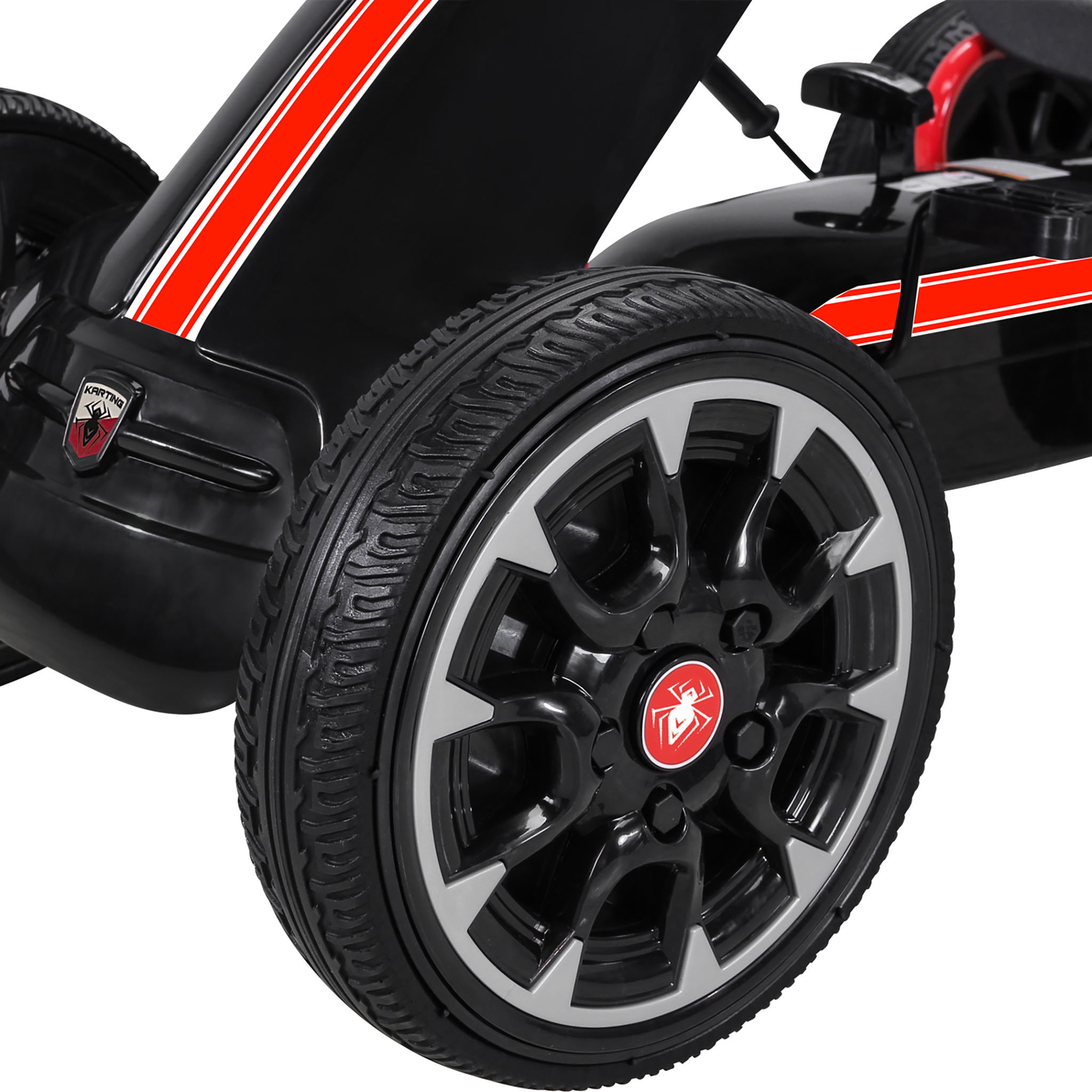 Schwarzer Go-Kart mit roten und weißen Streifen und einem Spinnenlogo.