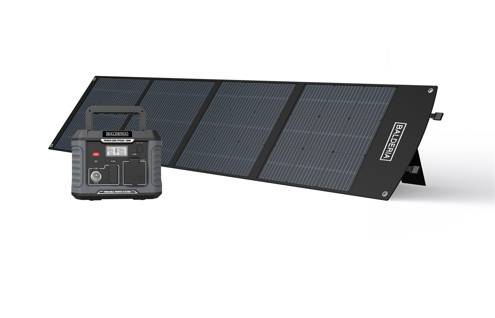 Eine graue tragbare Powerstation mit einem schwarzen Solarpanel-Array dahinter.