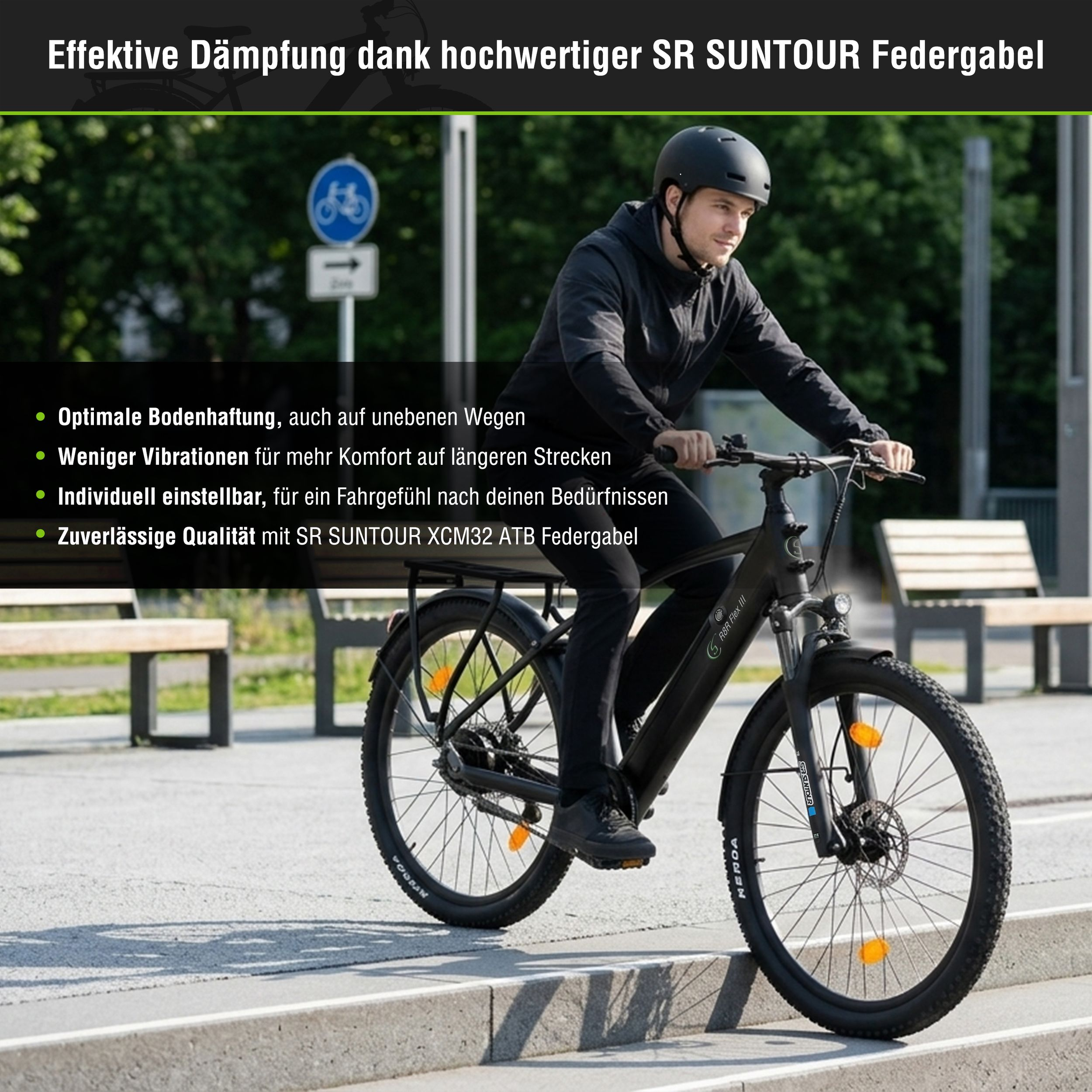 Ein Mann in Schwarz fährt ein schwarzes E-Bike mit SR Suntour Federgabel, draußen auf einer Straße.