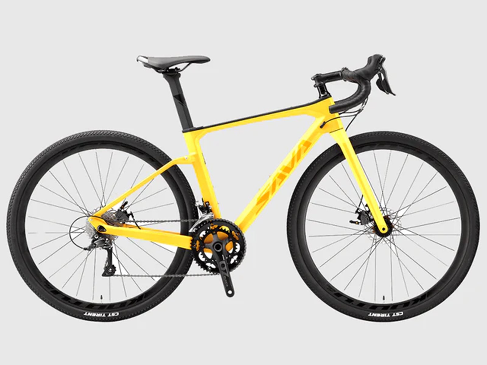Ein gelbes Gravelbike mit schwarzer Bereifung und Felgen steht vor grauem Hintergrund.