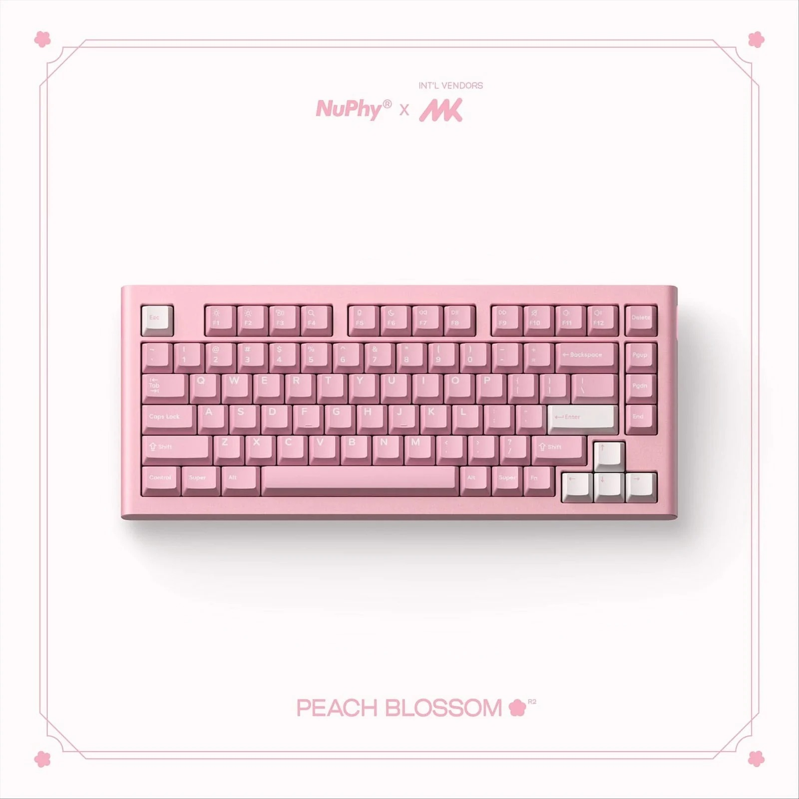 Jasnoróżowa klawiatura z napisem "PEACH BLOSSOM" na białym tle.