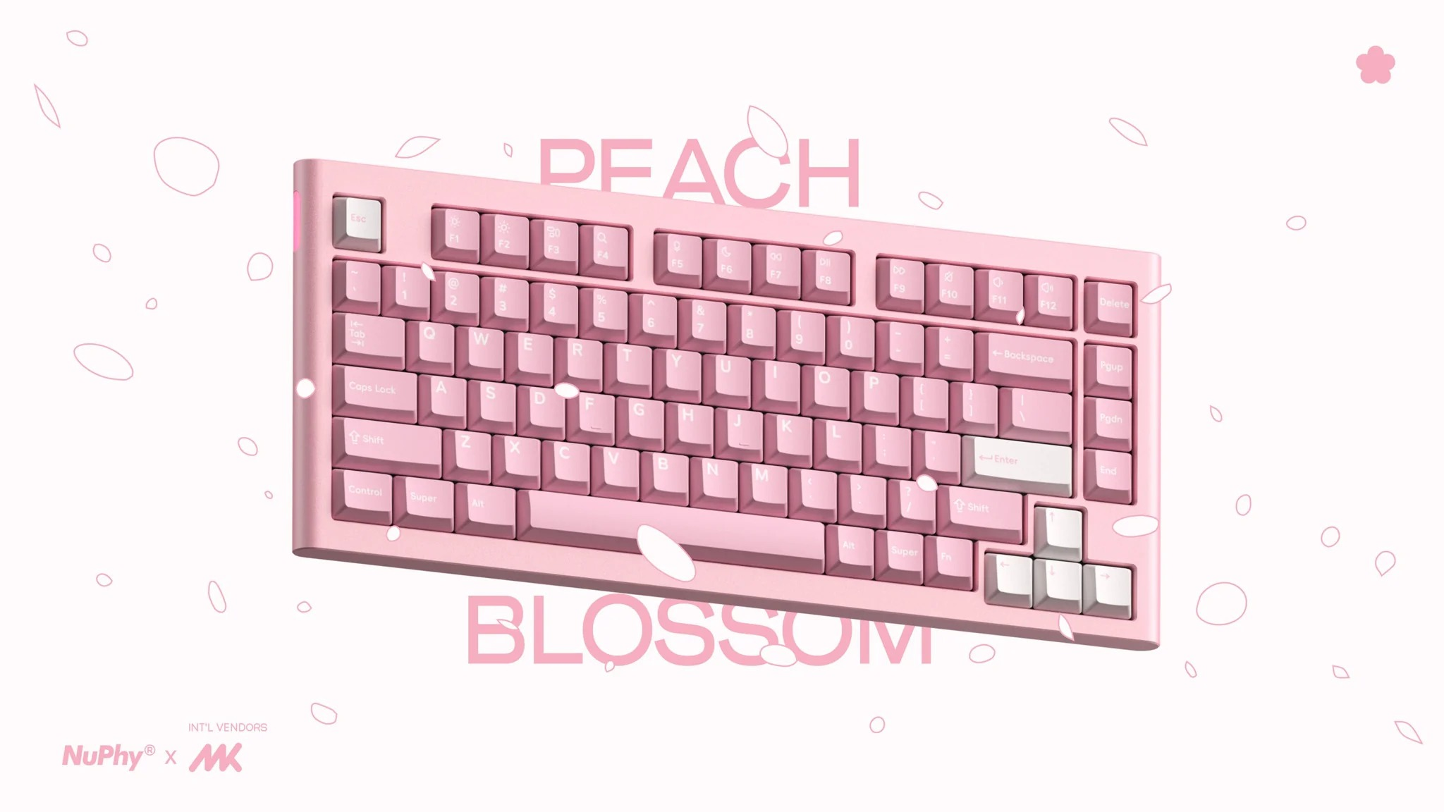 Jasnoróżowa klawiatura z napisem "PEACH BLOSSOM" i kwiatami wiśni.