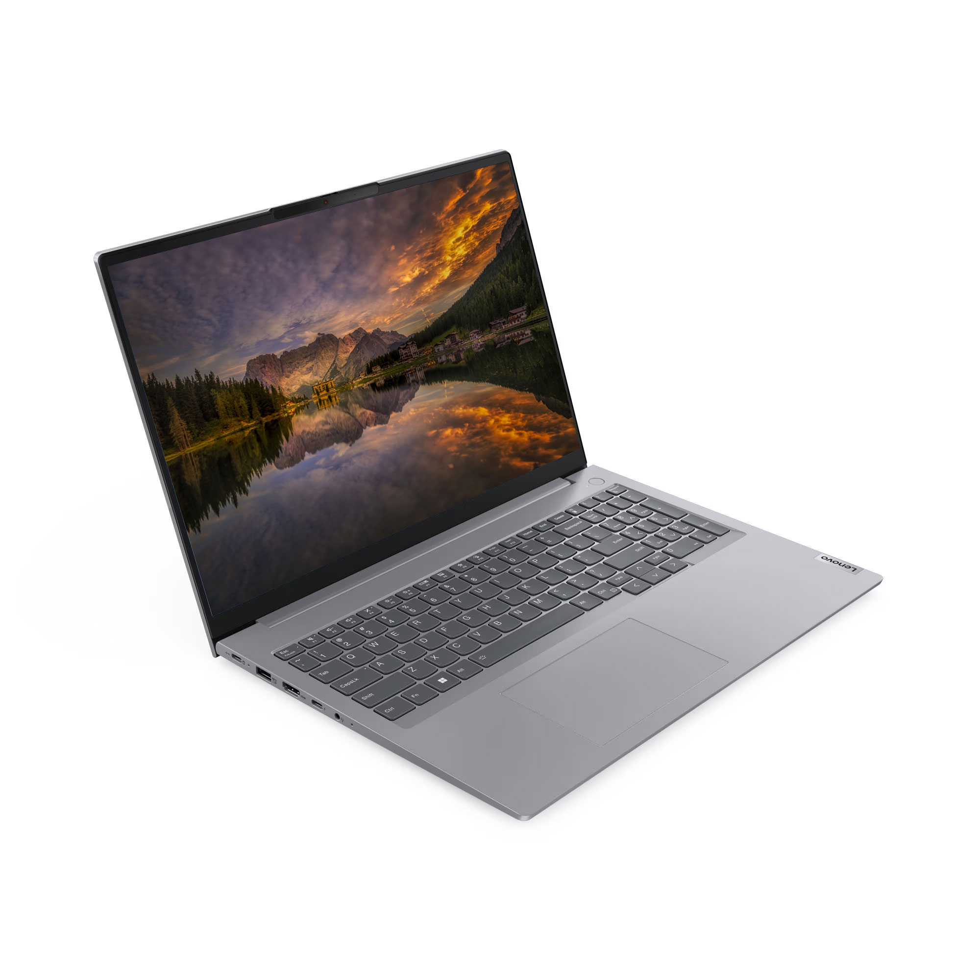 Açık ekranında dağ gölü manzaralı duvar kağıdı bulunan gri bir Lenovo dizüstü bilgisayar.