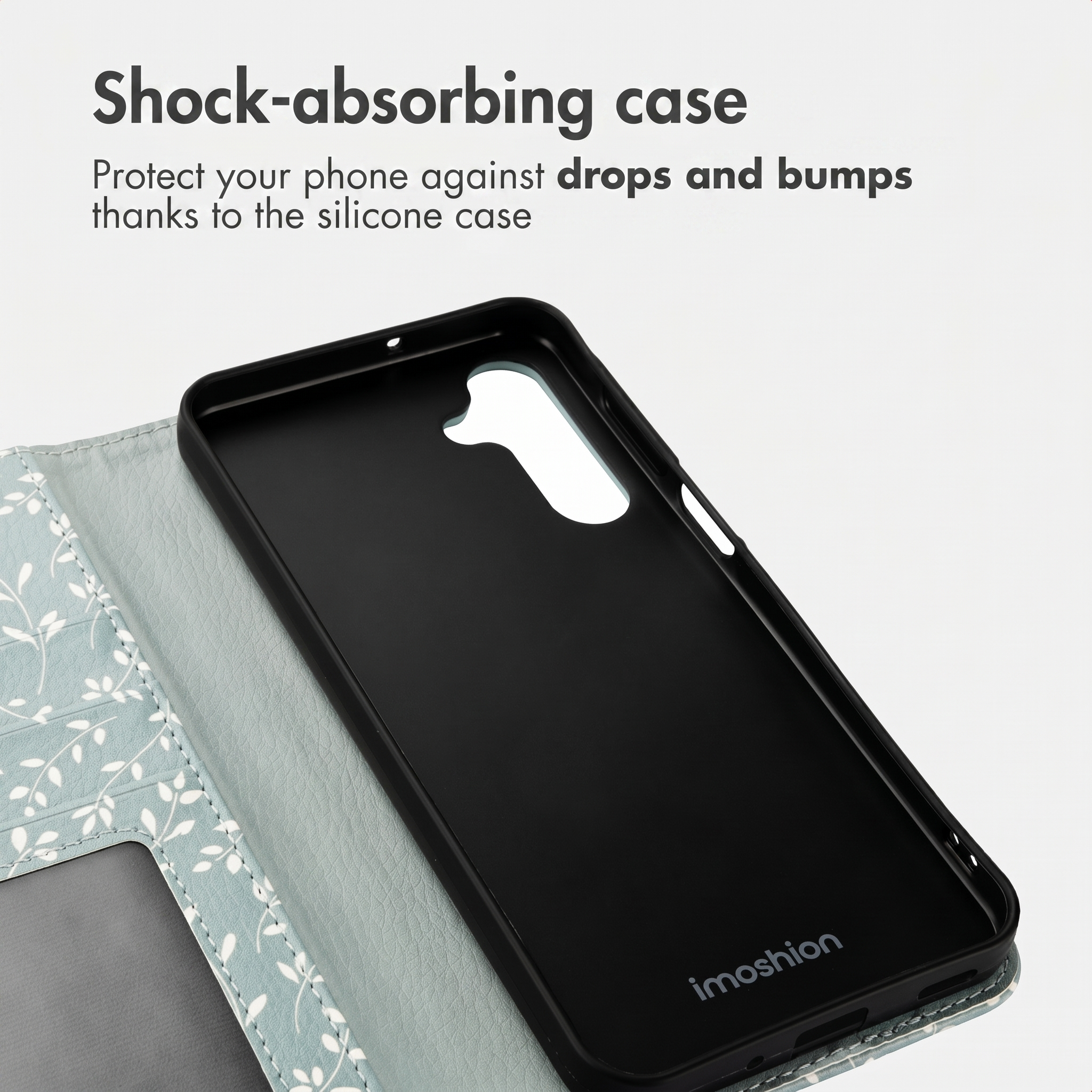 Zwarte telefoonhoes met lichtblauwe, bladerenpatroon flip cover.