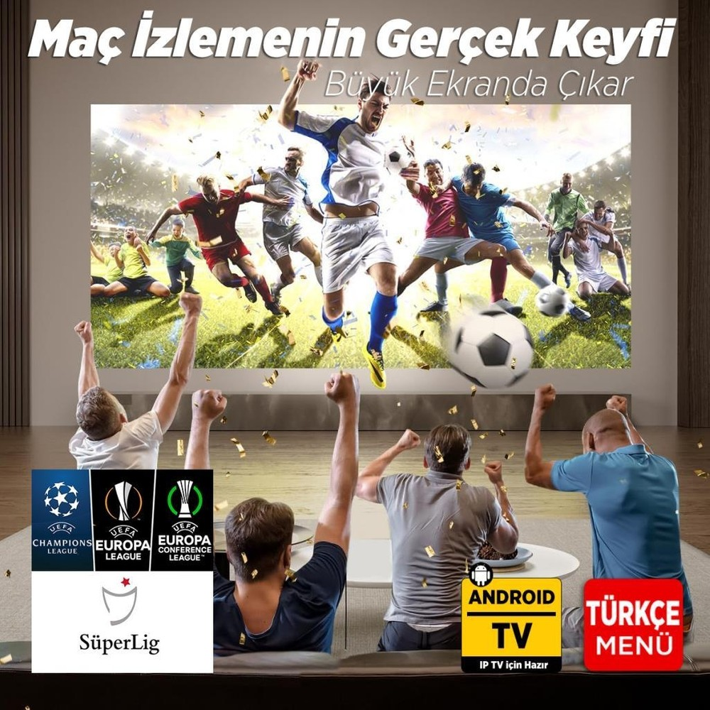 İnsanlar ekrandaki büyük futbol maçını izleyip tezahürat yapıyor, konfetiler düşüyor.